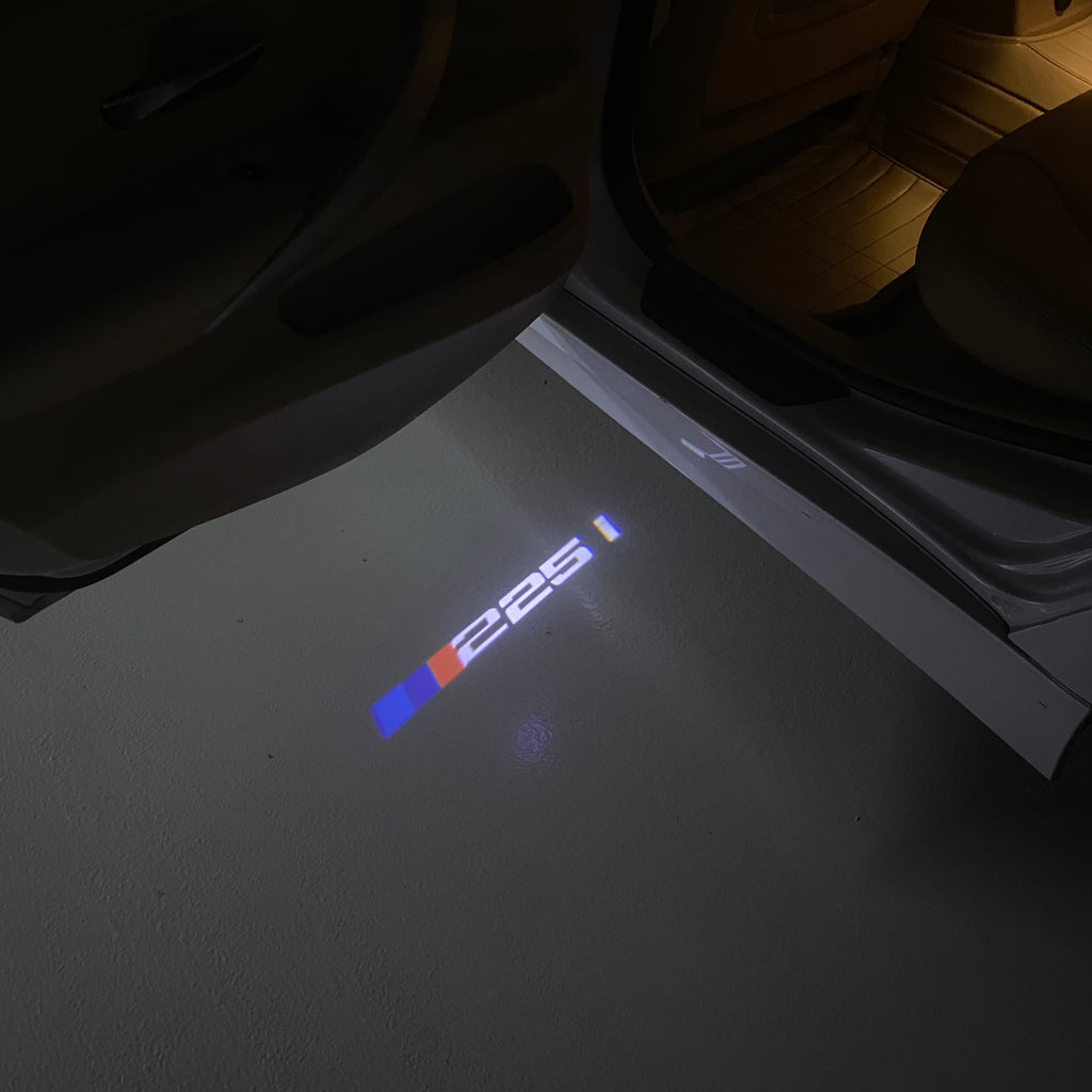 BMW M3 LOGO PROJECTOR LIGHTS Nr.24 (الكمية 1 = 1 مجموعة / 2 أضواء باب)
