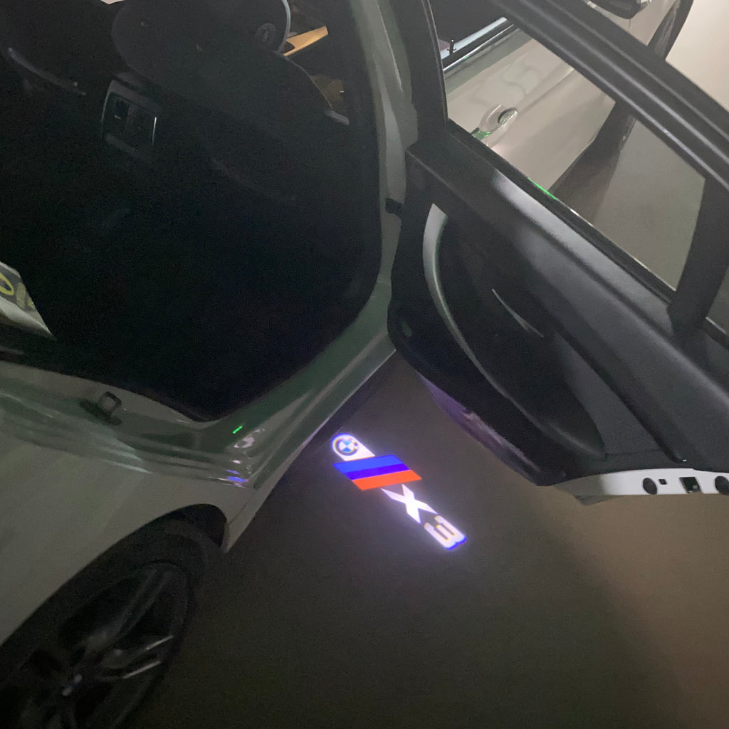 BMW X3    LOGO PROJECTOT LIGHTS (quantity 1 = 1 sets/2 door lights) Nr.6024q0t29
