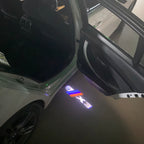 BMW X3    LOGO PROJECTOT LIGHTS (quantity 1 = 1 sets/2 door lights) Nr.6024q0t29