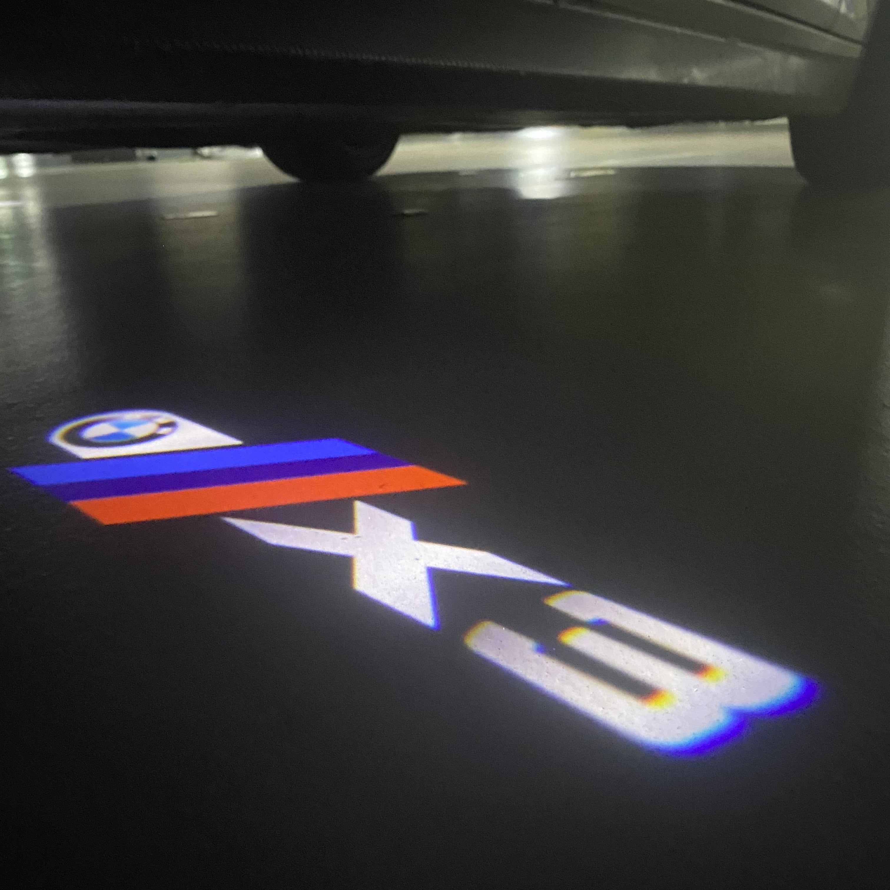 BMW X3    LOGO PROJECTOT LIGHTS (quantity 1 = 1 sets/2 door lights) Nr.6024q0t29