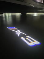 BMW X3  LOGO PROJECTOT LIGHTS (quantity 1 = 1 sets/2 door lights) Nr.6024q0t28