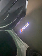 BMW X3  LOGO PROJECTOT LIGHTS (quantity 1 = 1 sets/2 door lights) Nr.6024q0t28