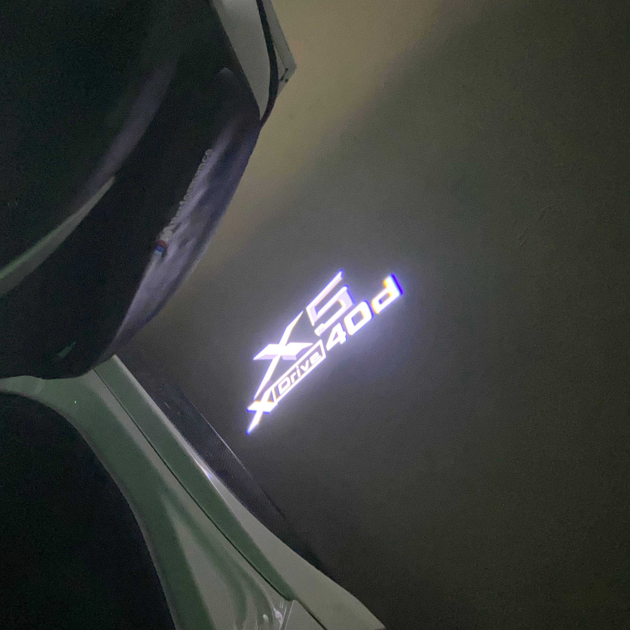 BMW  X5  X Drive 40d  LOGO PROJECTOT LIGHTS (quantity 1 = 1 sets/2 door lights) Nr.6024q0t082