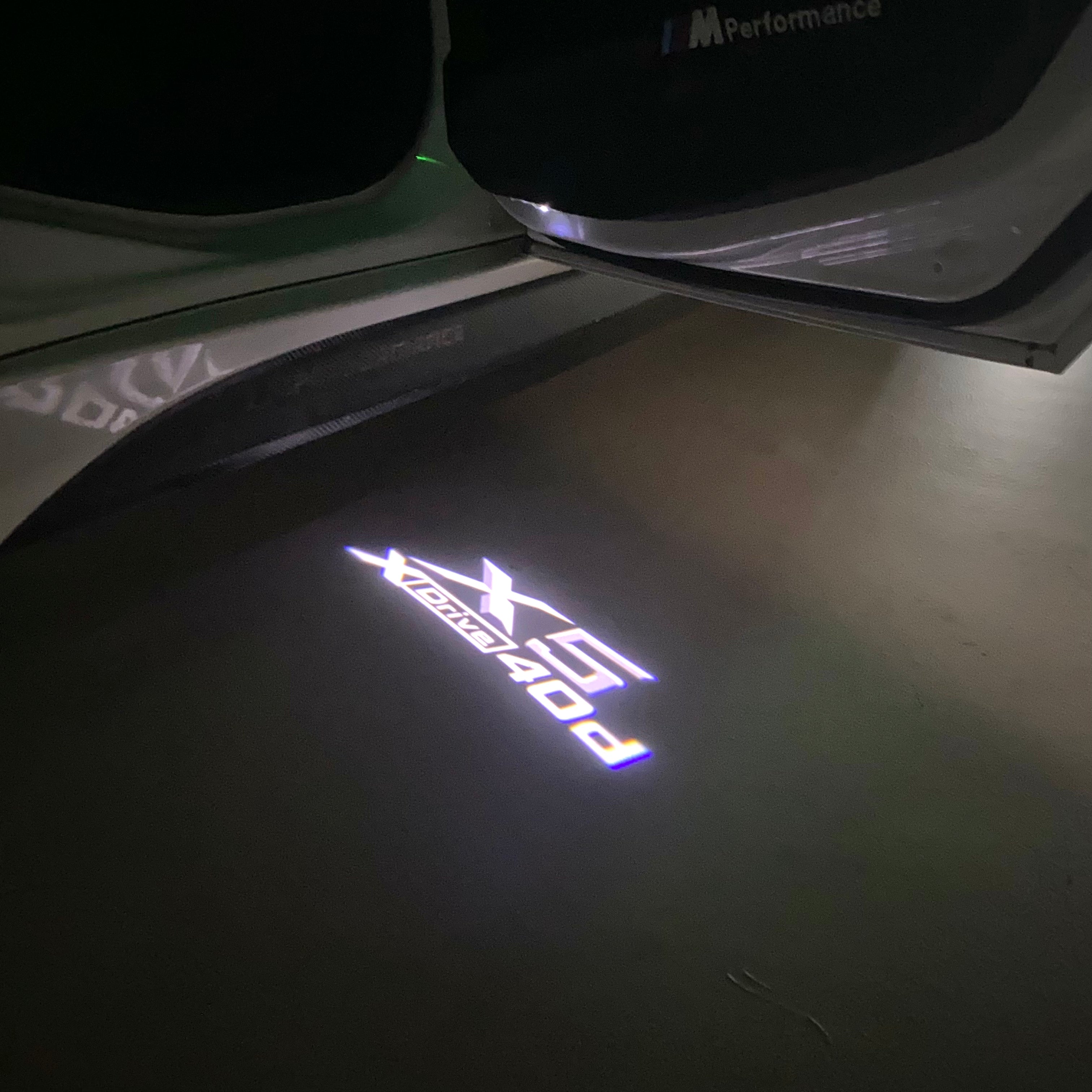 BMW  X5  X Drive 40d  LOGO PROJECTOT LIGHTS (quantity 1 = 1 sets/2 door lights) Nr.6024q0t082