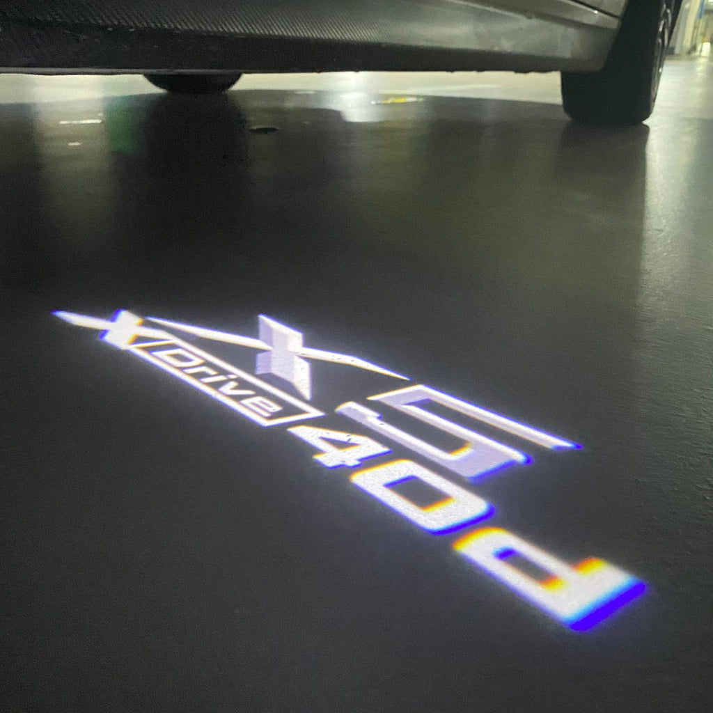 BMW  X5  X Drive 40d  LOGO PROJECTOT LIGHTS (quantity 1 = 1 sets/2 door lights) Nr.6024q0t082