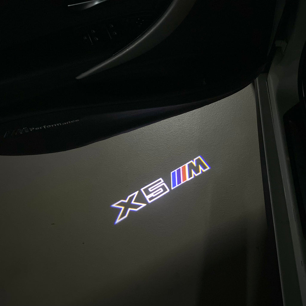 BMW X5M LOGO PROJECTOT LIGHTS (quantity 1 = 1 sets/2 door lights) Nr.6024q0t071