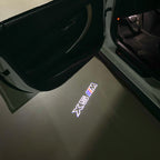 BMW X5M LOGO PROJECTOT LIGHTS (quantity 1 = 1 sets/2 door lights) Nr.6024q0t071