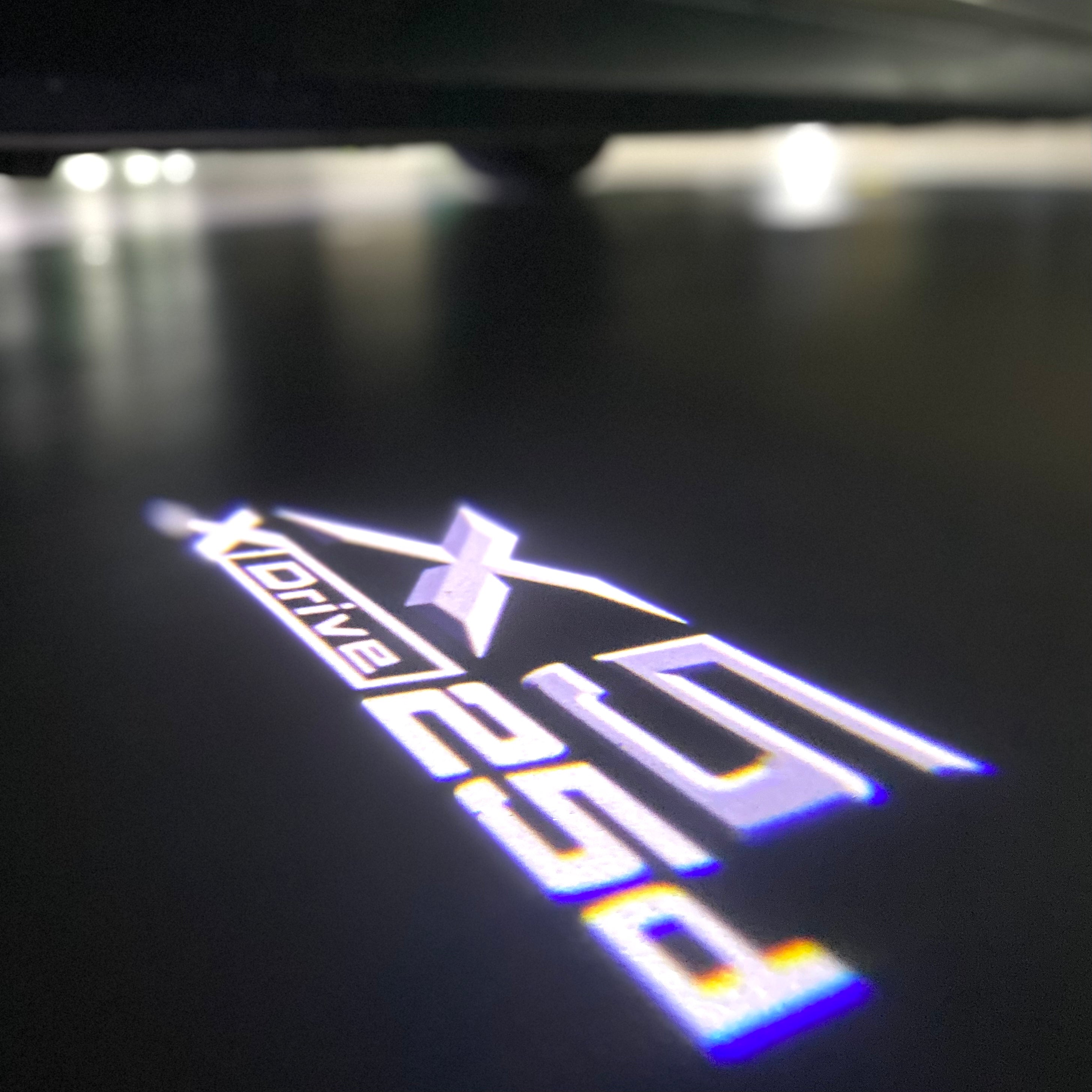 BMW X5 XDrive 25d  LOGO PROJECTOT LIGHTS (quantity 1 = 1 sets/2 door lights) Nr.6024q0t064