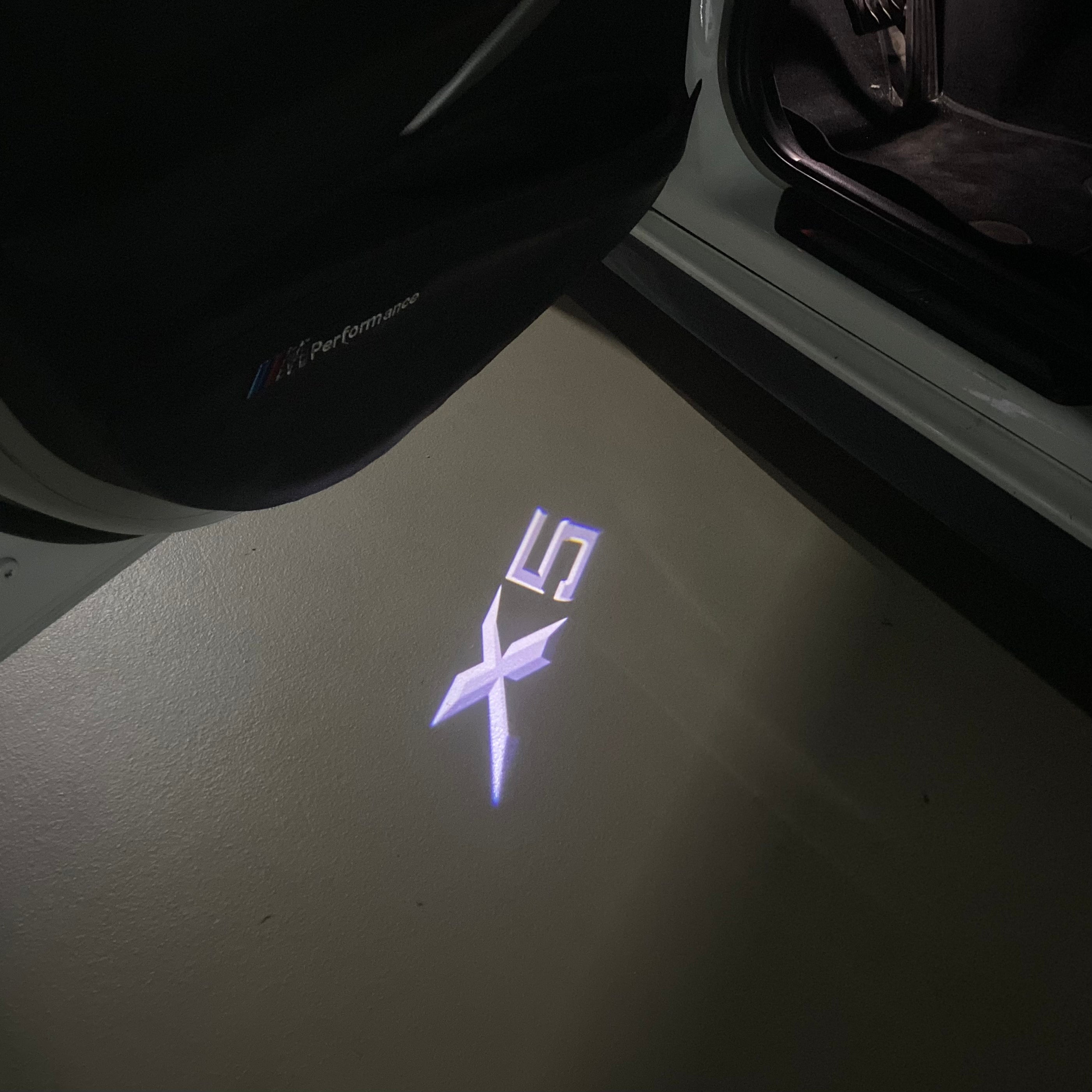 BMW X5    LOGO PROJECTOT LIGHTS (quantity 1 = 1 sets/2 door lights) Nr.6024q0t083