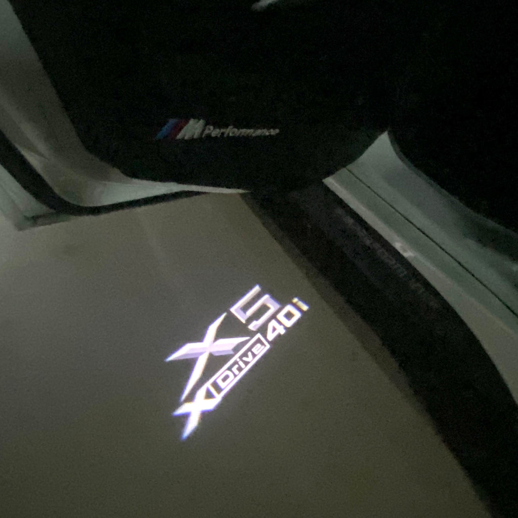 BMW X5 Xdrive 40i LOGO PROJECTOT LIGHTS (quantity 1 = 1 sets/2 door lights) Nr.6024q0t061