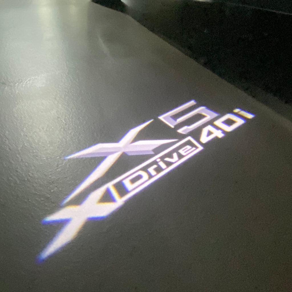 BMW X5 Xdrive 40i LOGO PROJECTOT LIGHTS (quantity 1 = 1 sets/2 door lights) Nr.6024q0t061
