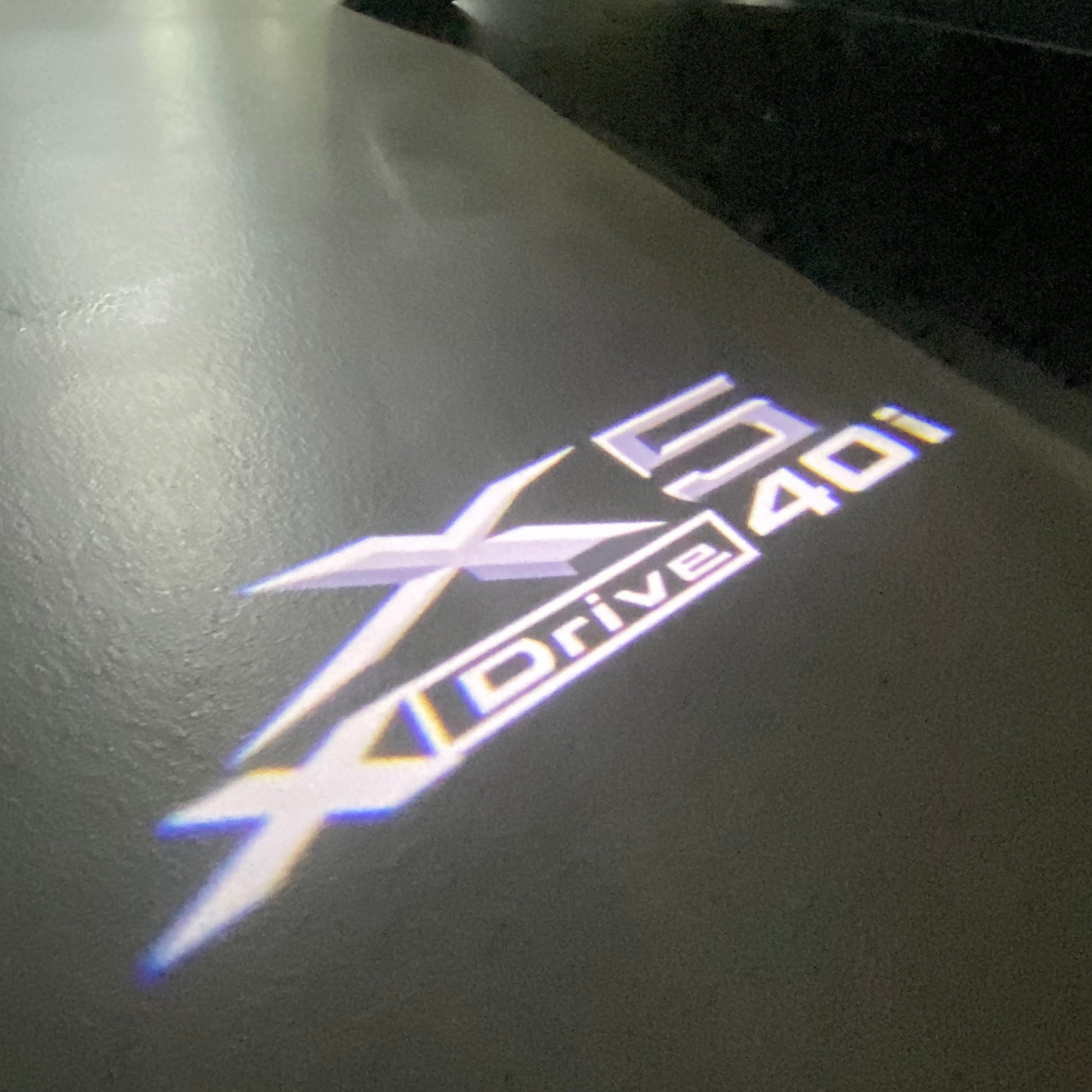 BMW X5 Xdrive 40i LOGO PROJECTOT LIGHTS (quantity 1 = 1 sets/2 door lights) Nr.6024q0t061