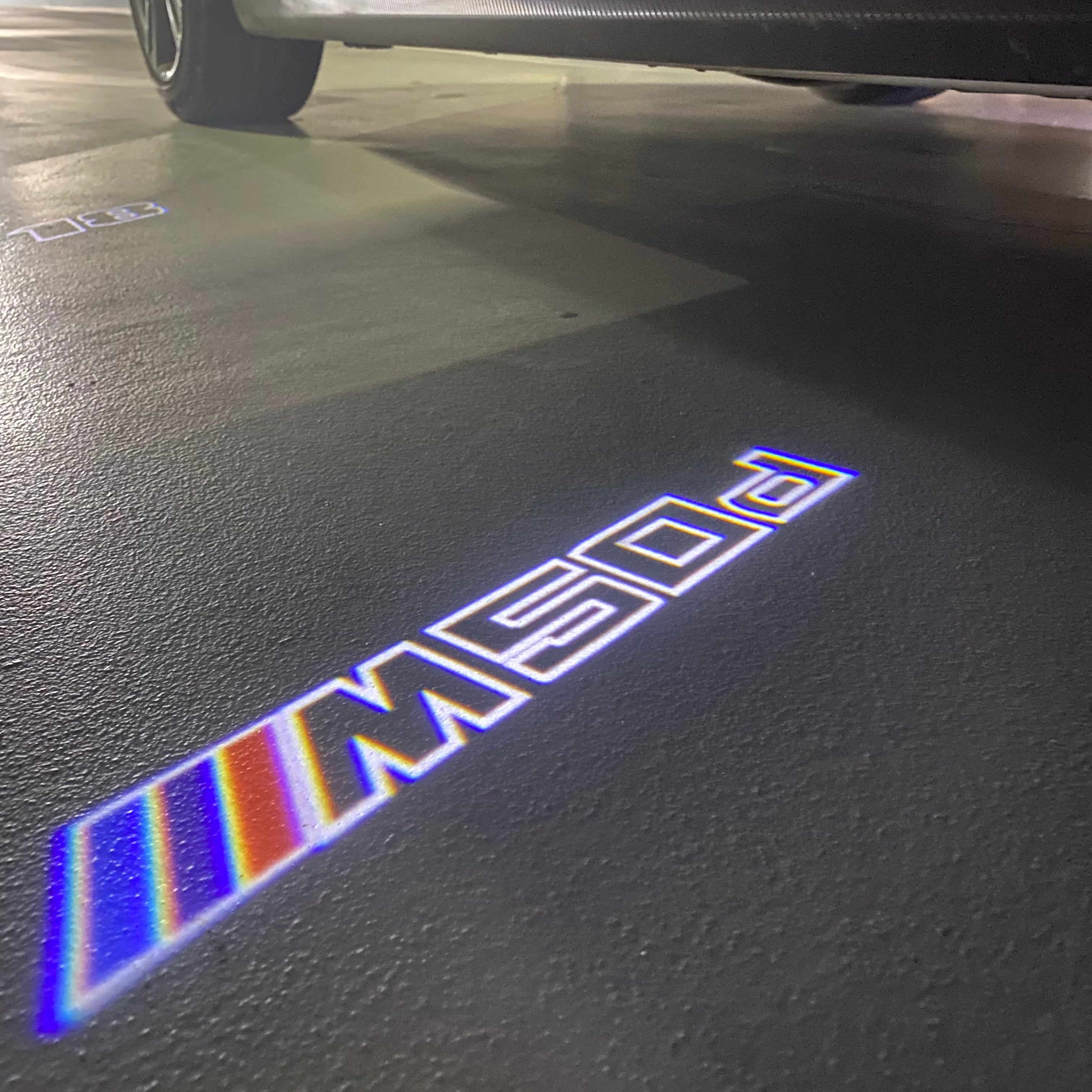 BMW X5 / X5M M50d  LOGO PROJECTOT LIGHTS (quantity 1 = 1 sets/2 door lights) Nr.6024q0t059