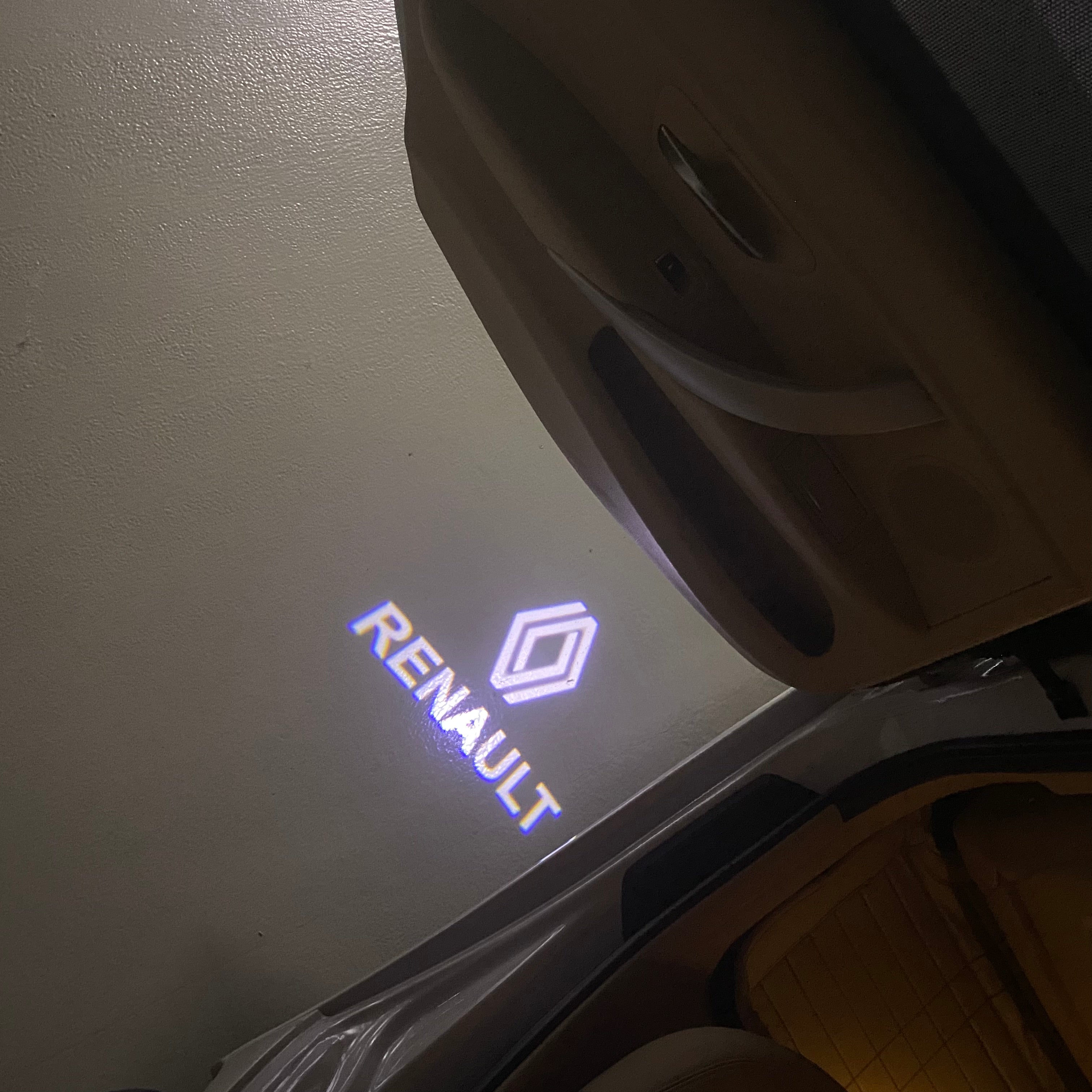 RENAULT ORIGINAL LOGO PROJECROTR LIGHTS Nr.0963 (quantity  1 =  2 Logo Film & 2 door lights)