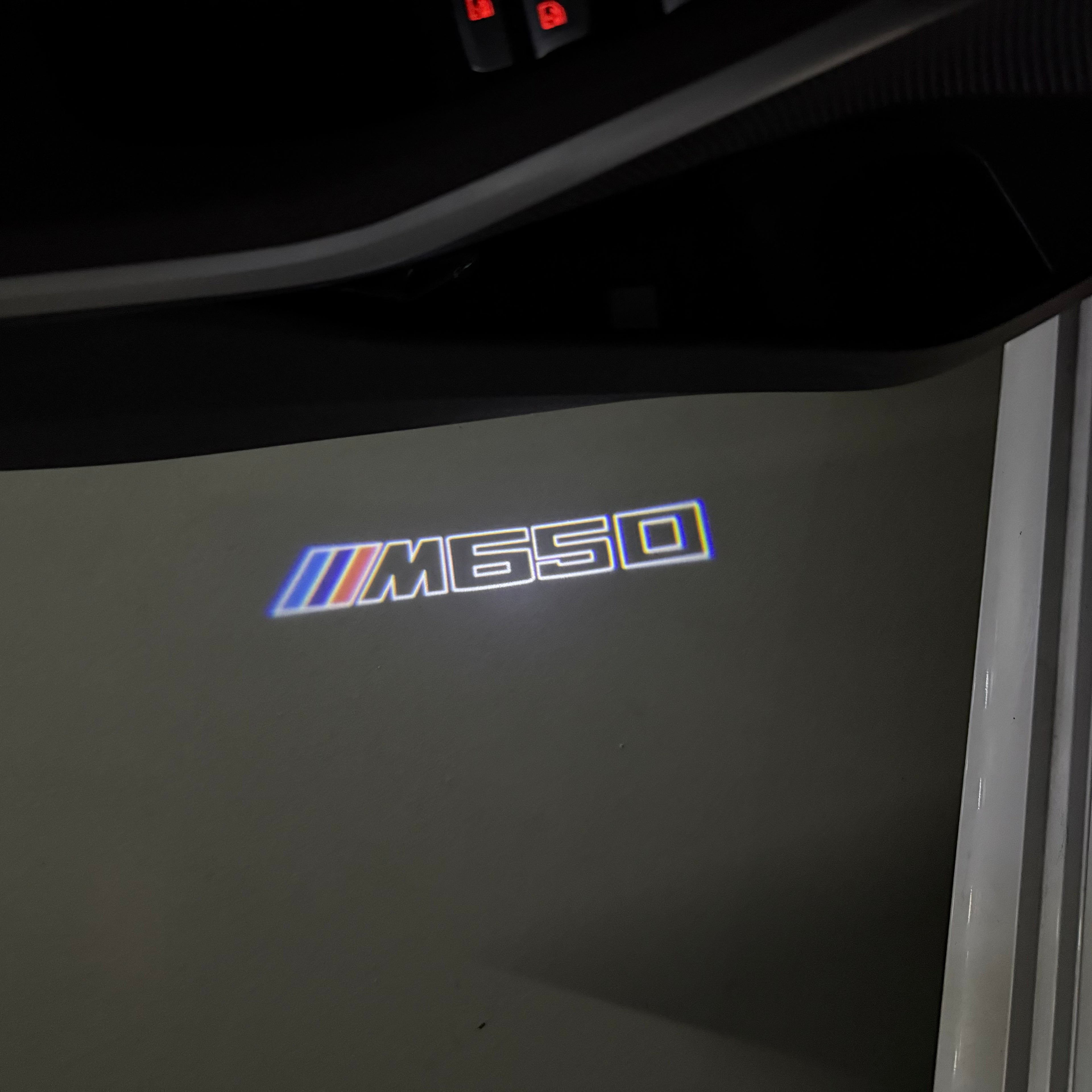 BMW 6 SERIES M650   LOGO PROJECTOT LIGHTS (quantity 1 = 1 sets/2 door lights) Nr.6024S27