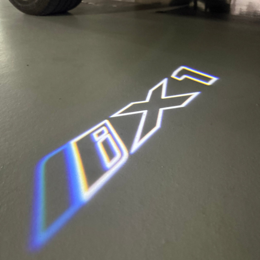 BMW iX1    LOGO PROJECTOT LIGHTS (quantity 1 = 1 sets/2 door lights) Nr.6024q142