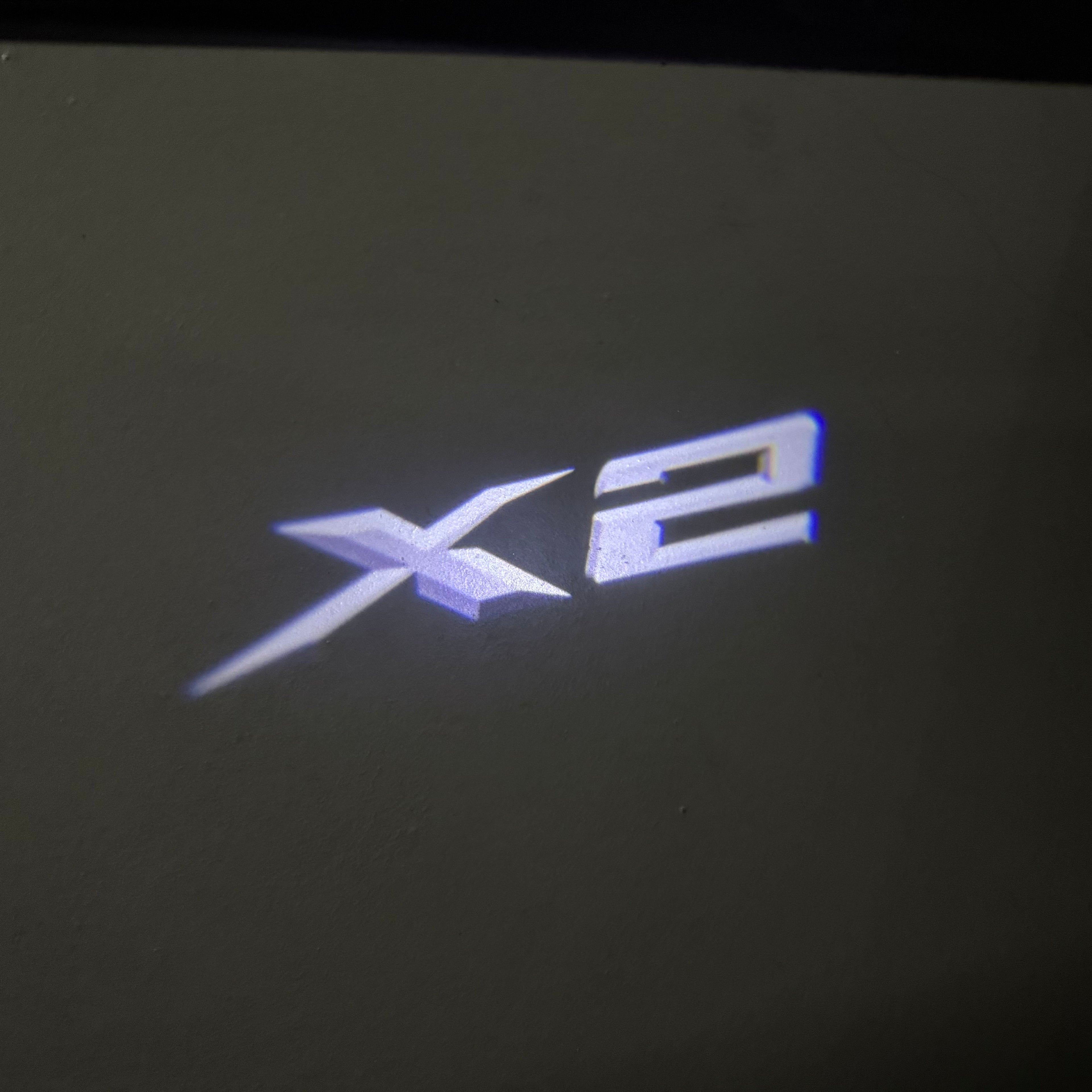 BMW X2  LOGO PROJECTOT LIGHTS (quantity 1 = 1 sets/2 door lights) Nr.6024q10
