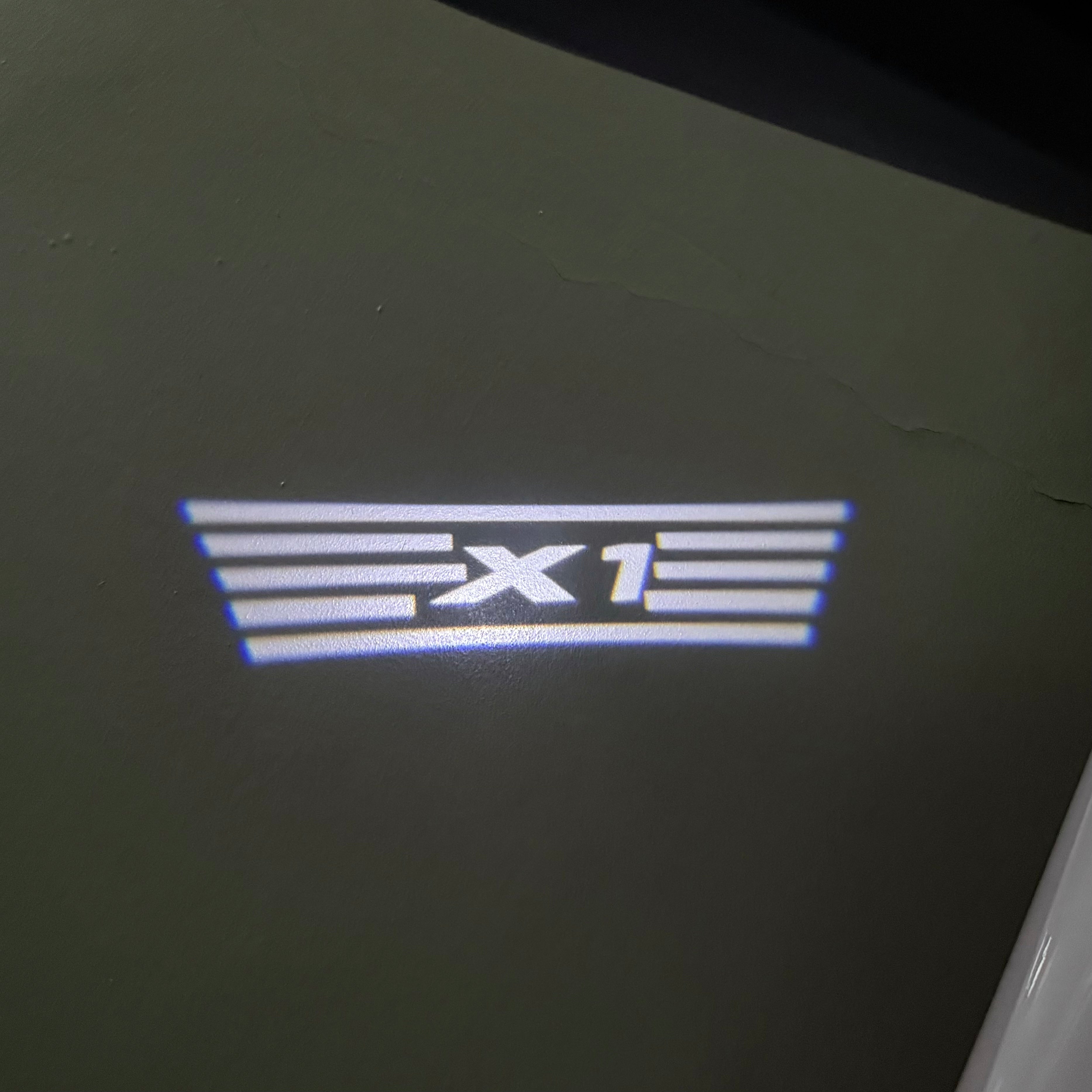 BMW X1  LOGO PROJECTOT LIGHTS (quantity 1 = 1 sets/2 door lights) Nr.6024q04