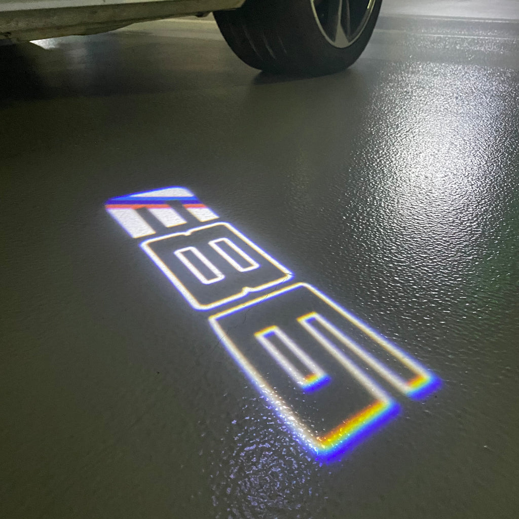 ÉCLAIRAGE DE PROJECTEUR BMW M3 LOGO Nr.24 (quantité 1 = 1 jeux / 2 feux de porte)