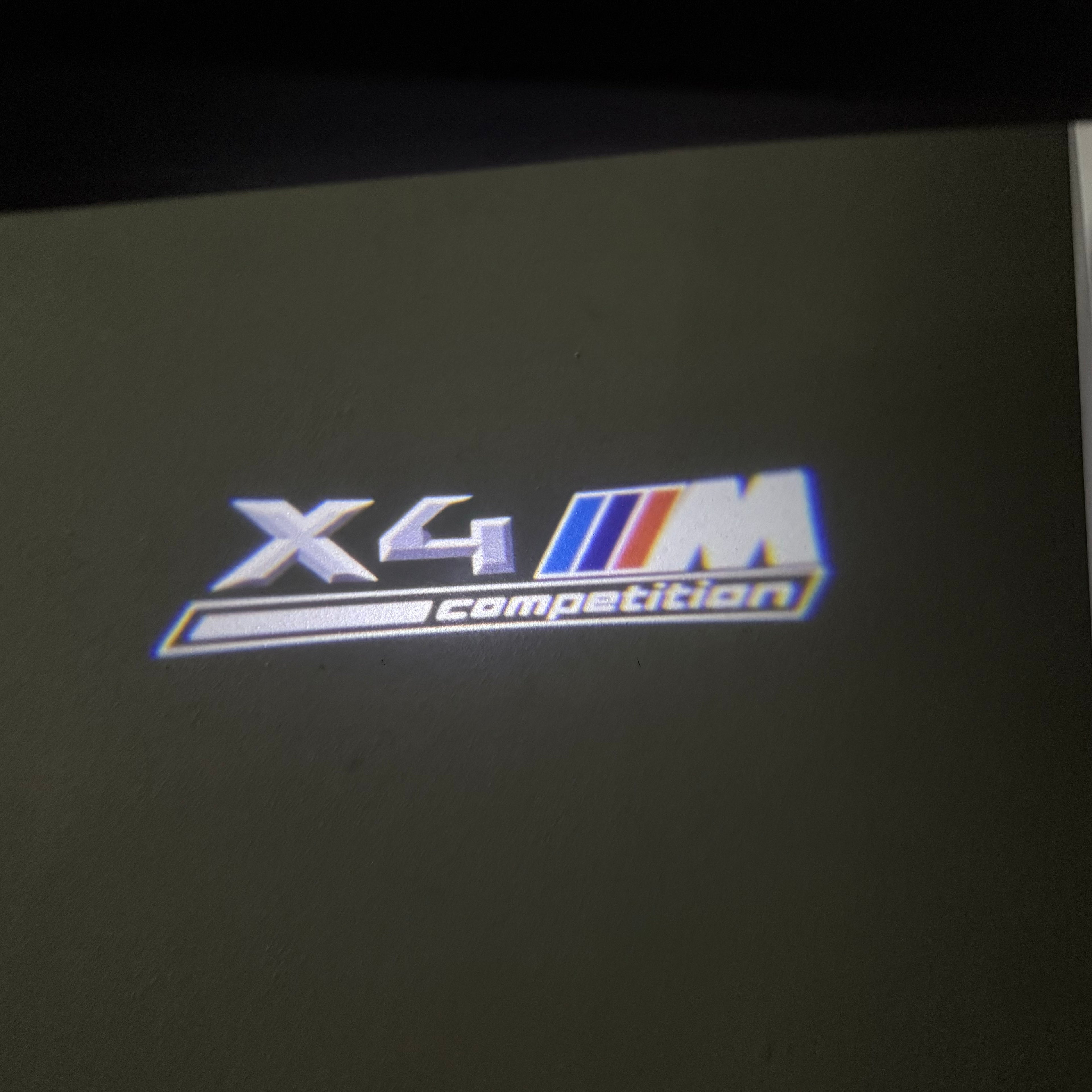 BMW X4M  LOGO PROJECTOT LIGHTS (quantity 1 = 1 sets/2 door lights) Nr.6024q0t042