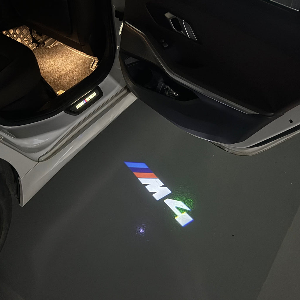 ÉCLAIRAGE DE PROJECTEUR BMW M3 LOGO Nr.24 (quantité 1 = 1 jeux / 2 feux de porte)