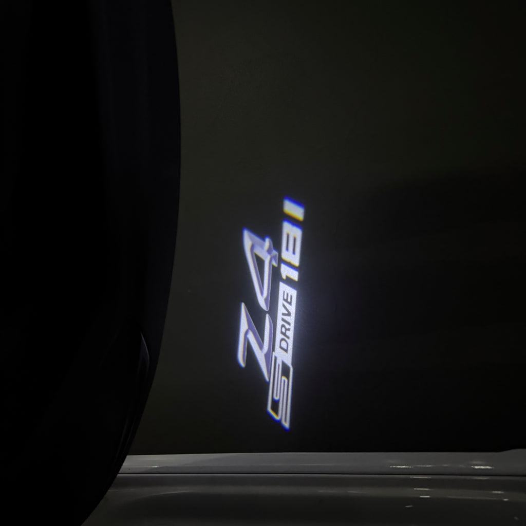 BMW Z4 S drive  LOGO PROJECTOT LIGHTS (quantity 1 = 1 sets/2 door lights) Nr.6024q0t0129