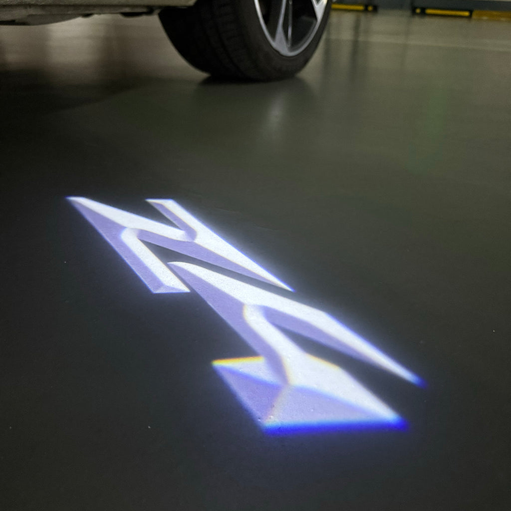 BMW Z4  LOGO PROJECTOT LIGHTS (quantity 1 = 1 sets/2 door lights) Nr.6024q0t0127