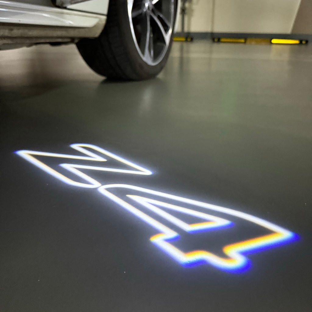BMW Z4    LOGO PROJECTOT LIGHTS (quantity 1 = 1 sets/2 door lights) Nr.6024q0t0136