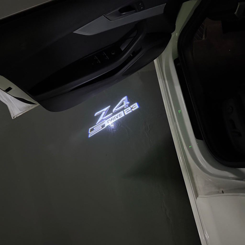 BMW   Z4 S drive LOGO PROJECTOT LIGHTS (quantity 1 = 1 sets/2 door lights) Nr.6024q0t0138