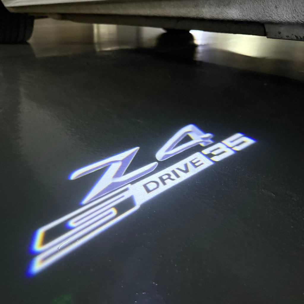 BMW  Z4 S drive  LOGO PROJECTOT LIGHTS (quantity 1 = 1 sets/2 door lights) Nr.6024q0t0131