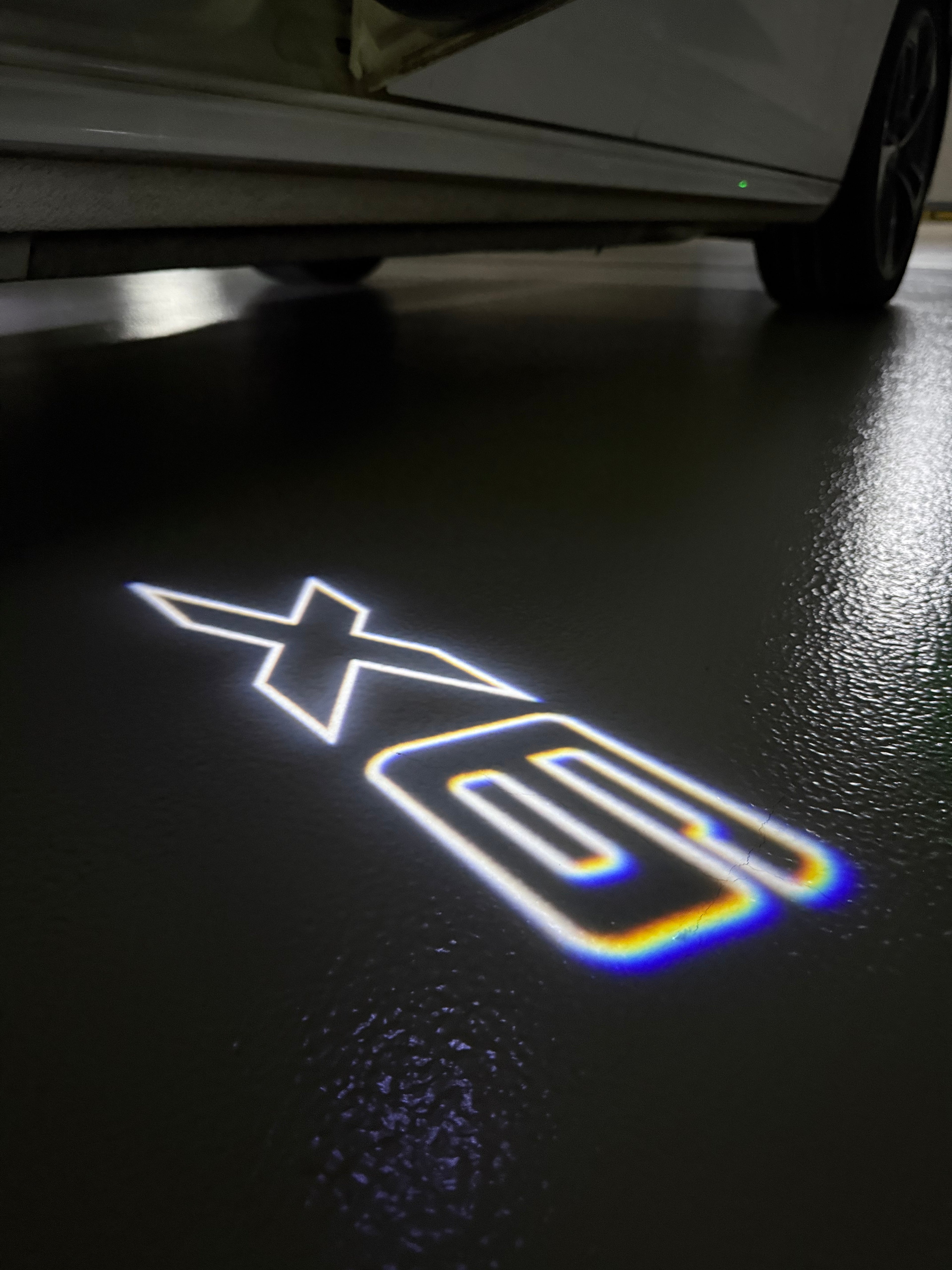 BMW X6  LOGO PROJECTOT LIGHTS (quantity 1 = 1 sets/2 door lights) Nr.6024q0t051