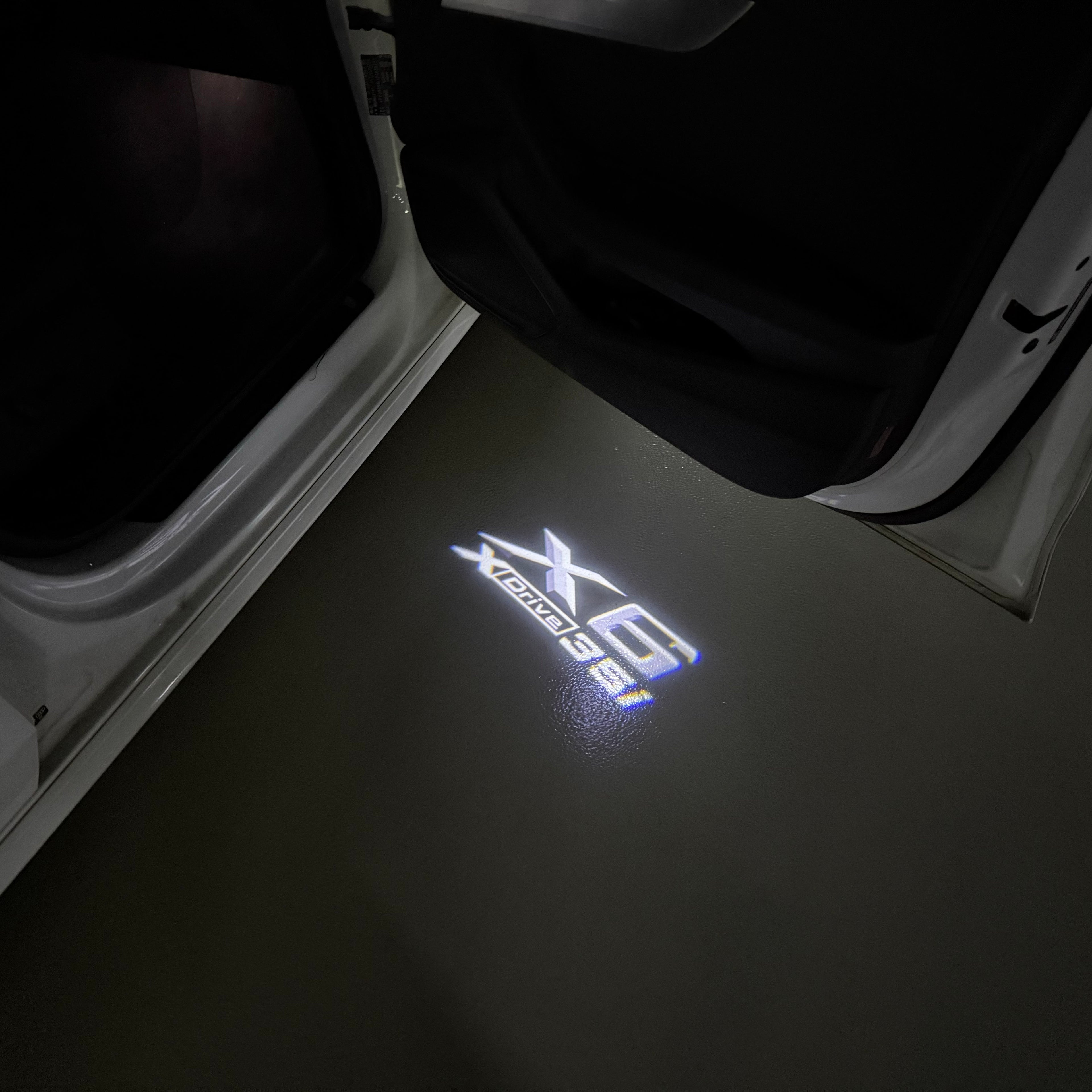 BMW X6 Xdrive  LOGO PROJECTOT LIGHTS (quantity 1 = 1 sets/2 door lights) Nr.6024q0t094