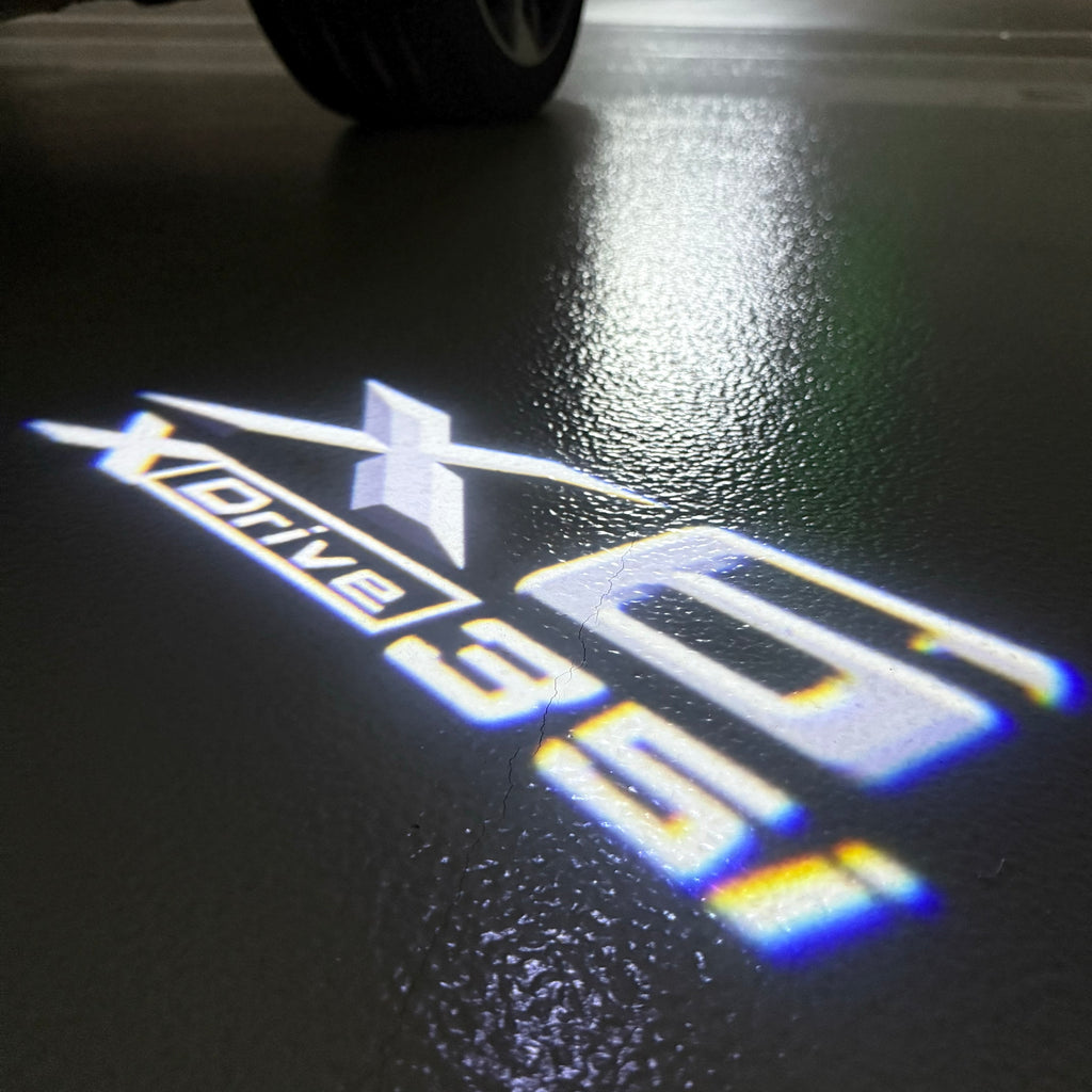 BMW X6 Xdrive  LOGO PROJECTOT LIGHTS (quantity 1 = 1 sets/2 door lights) Nr.6024q0t094