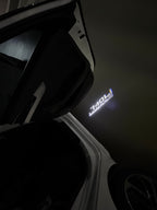 BMW M3 LOGO PROJECTOR LIGHTS Nr.24 (الكمية 1 = 1 مجموعة / 2 أضواء باب)