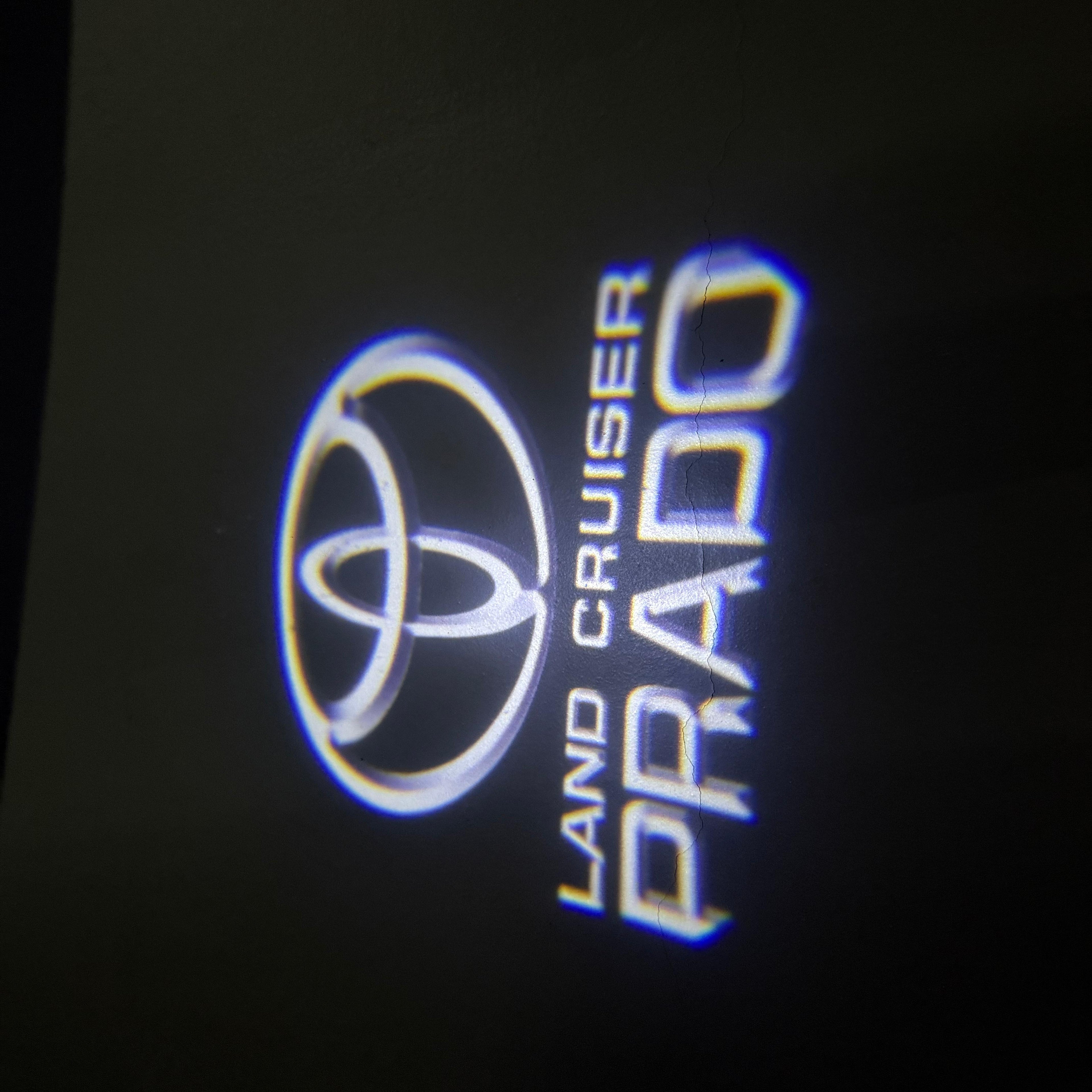 TOYOTA  PRADO LOGO PROJECROTR LIGHTS  (quantity 1 = 1 sets/2 door lights) Nr.0G17