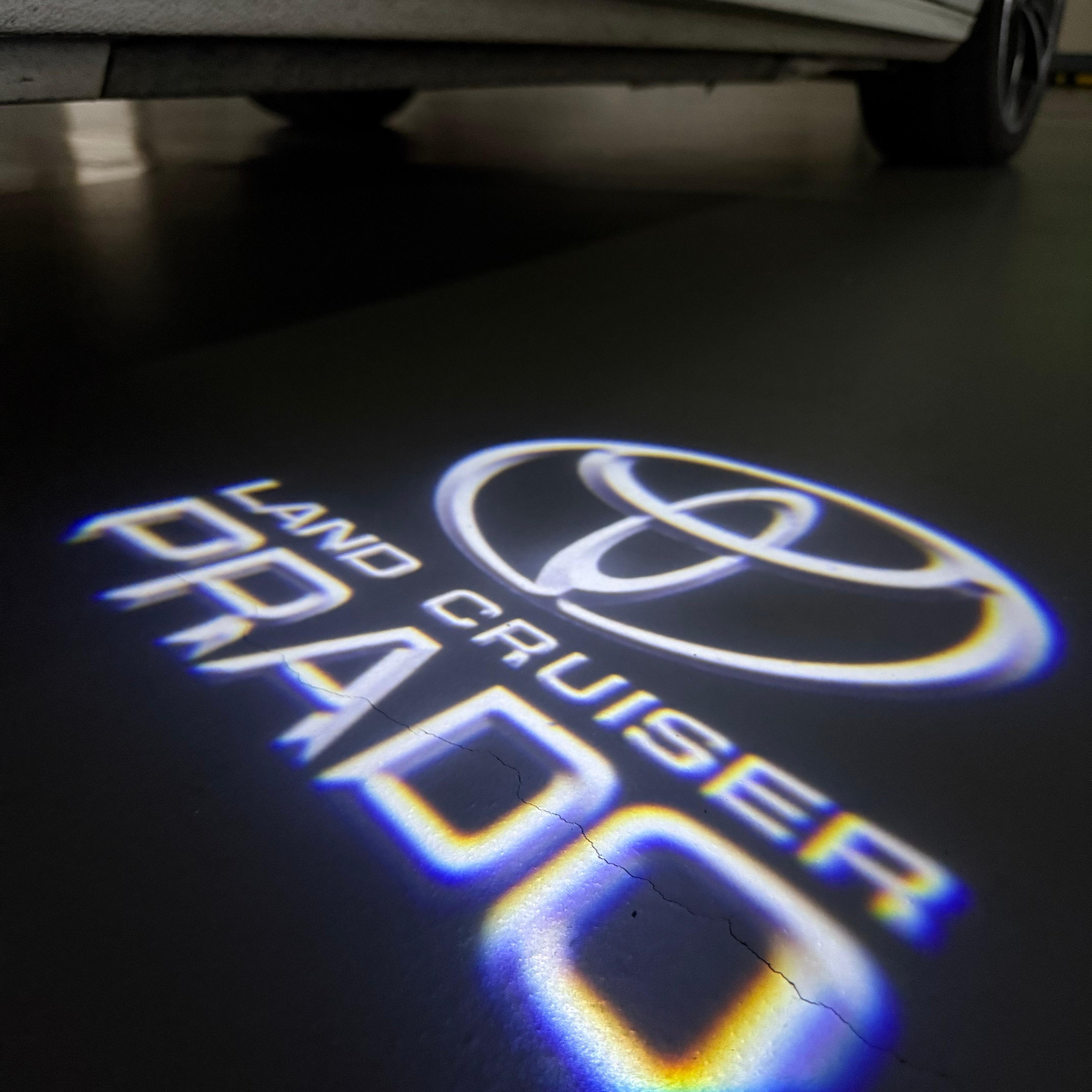 TOYOTA  PRADO LOGO PROJECROTR LIGHTS  (quantity 1 = 1 sets/2 door lights) Nr.0G17