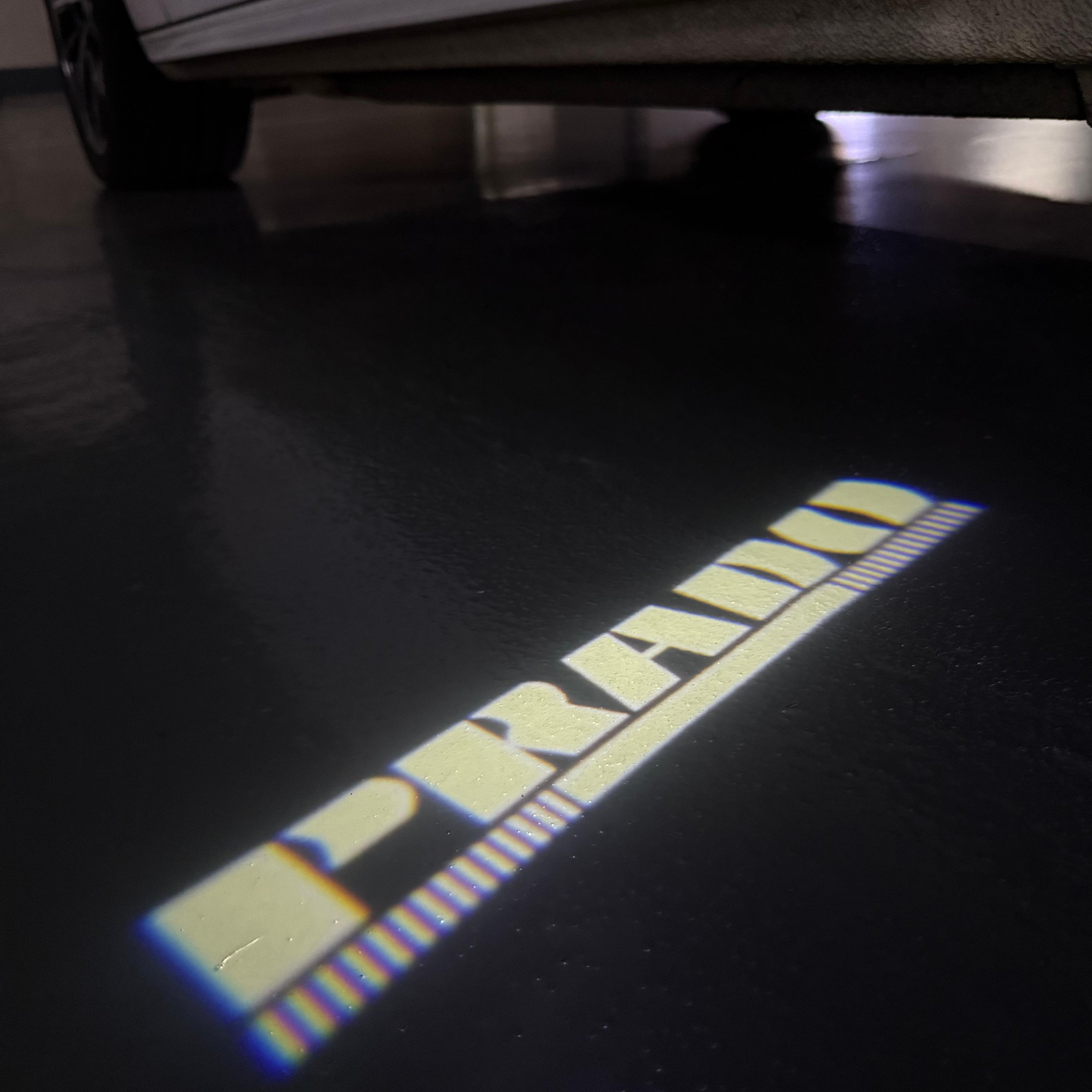 TOYOTA  PRADO LOGO PROJECROTR LIGHTS  (quantity 1 = 1 sets/2 door lights) Nr.0G15
