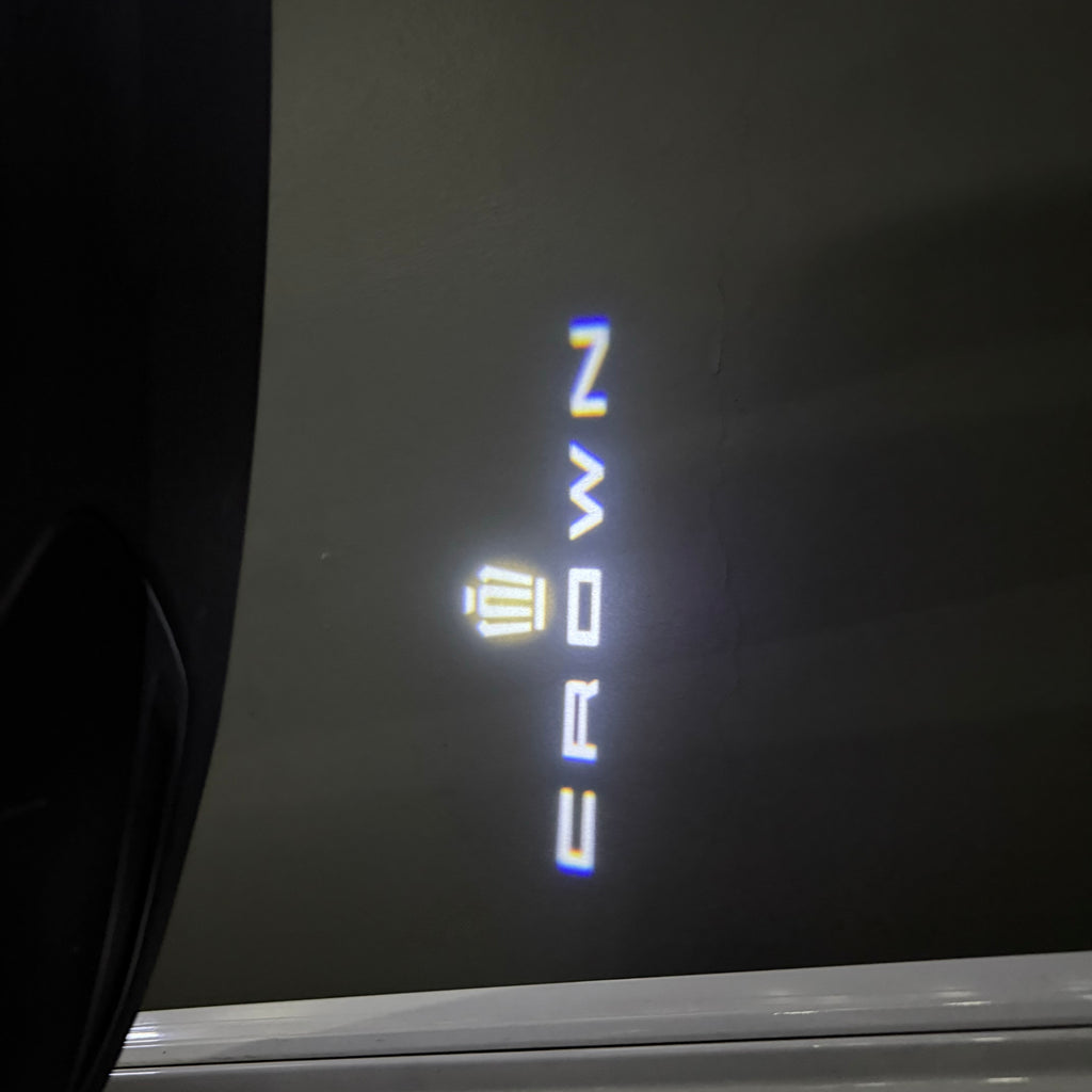 TOYOTA  CROWN  LOGO PROJECROTR LIGHTS  (quantity 1 = 1 sets/2 door lights) Nr.0GP32