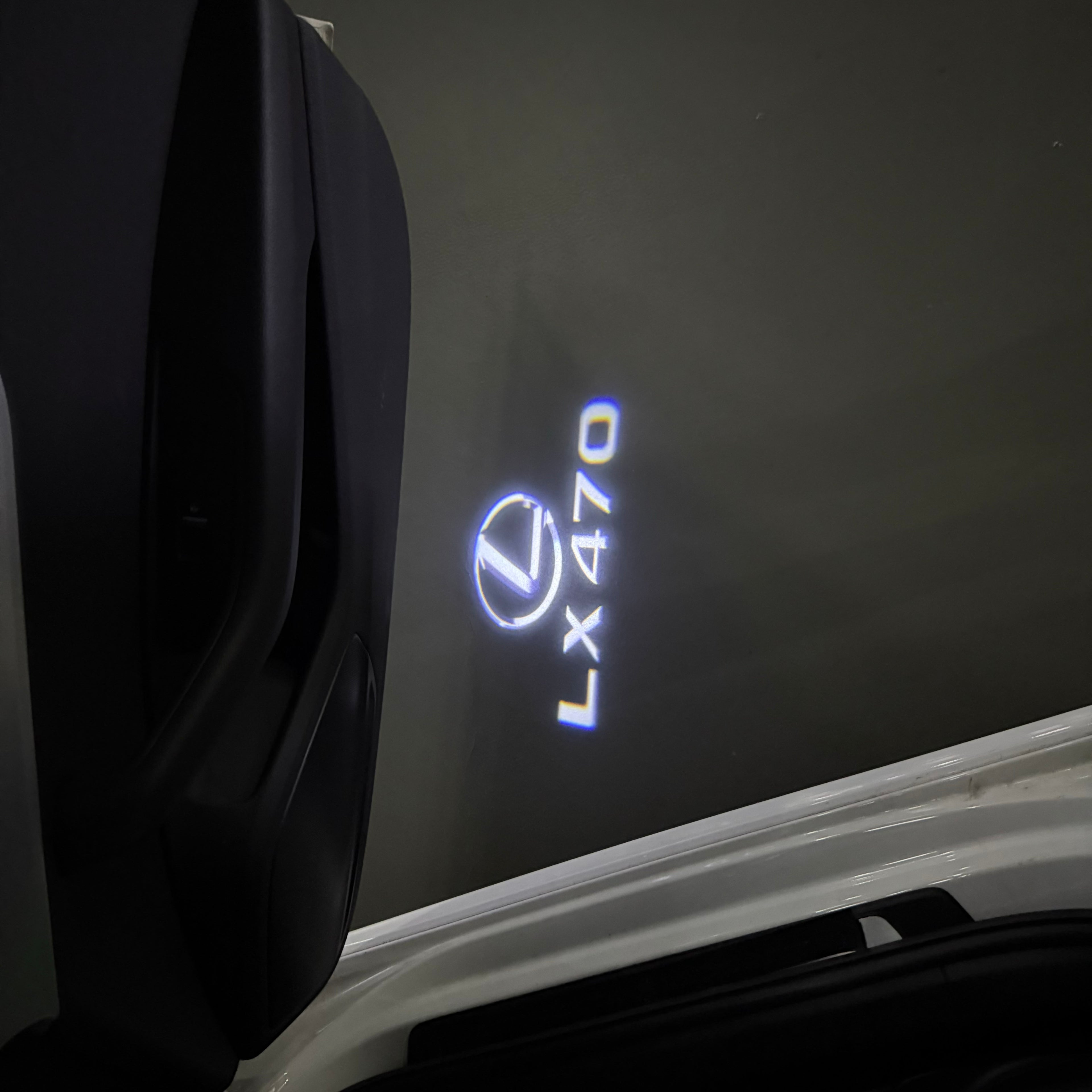 LEXUS  LX 470 LOGO PROJECROTR LIGHTS (quantity 1 = 1 sets/2 door lights)Nr.01a33