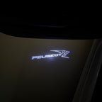 PEUGEOT ORIGINAL  LOGO PROJECTOT LIGHTS (quantity 1 = 1 sets/2 door lights) Nr.6024q64
