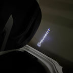 PEUGEOT ORIGINAL  LOGO PROJECTOT LIGHTS (quantity 1 = 1 sets/2 door lights) Nr.6024q63
