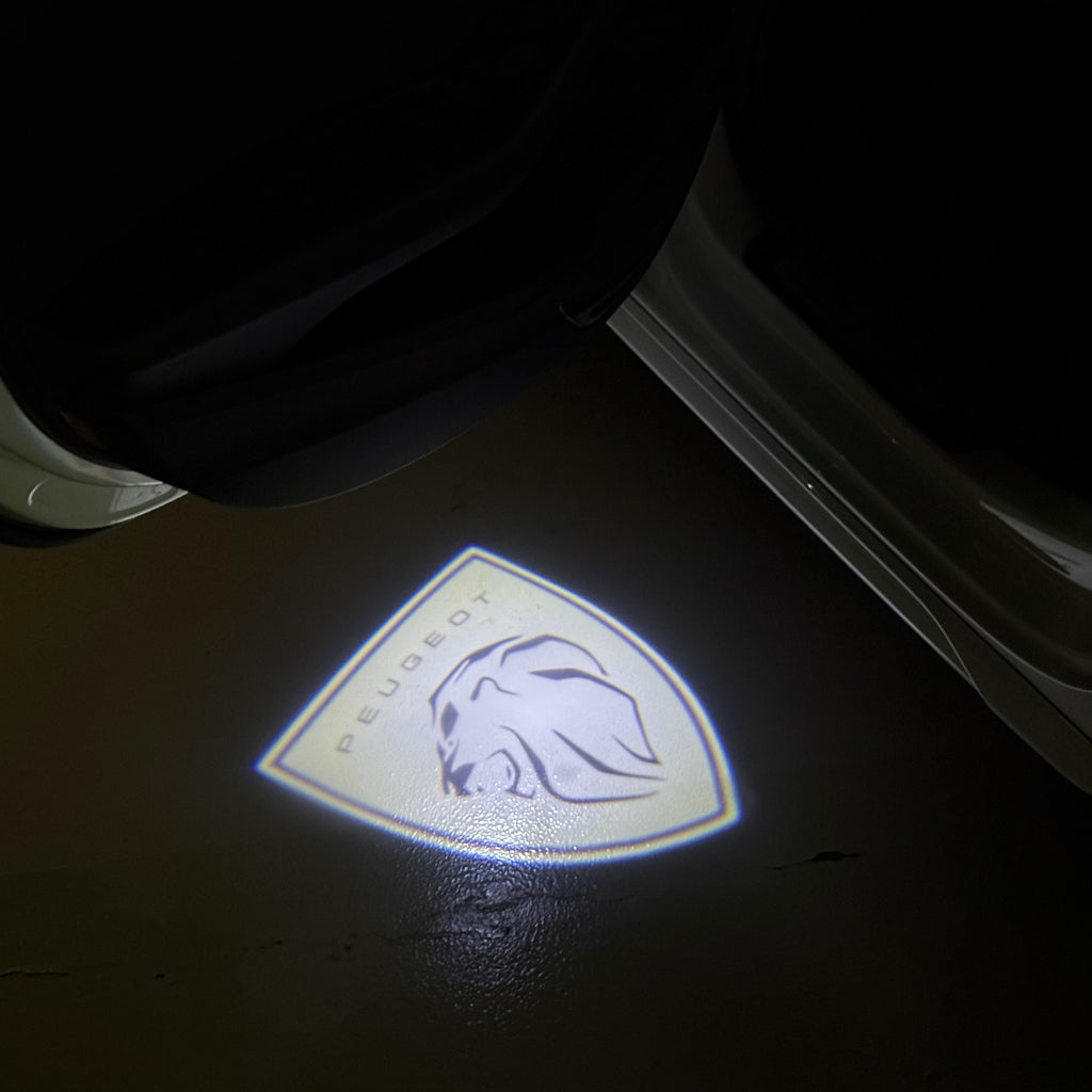 PEUGEOT ORIGINAL  LOGO PROJECTOT LIGHTS (quantity 1 = 1 sets/2 door lights) Nr.6024q73