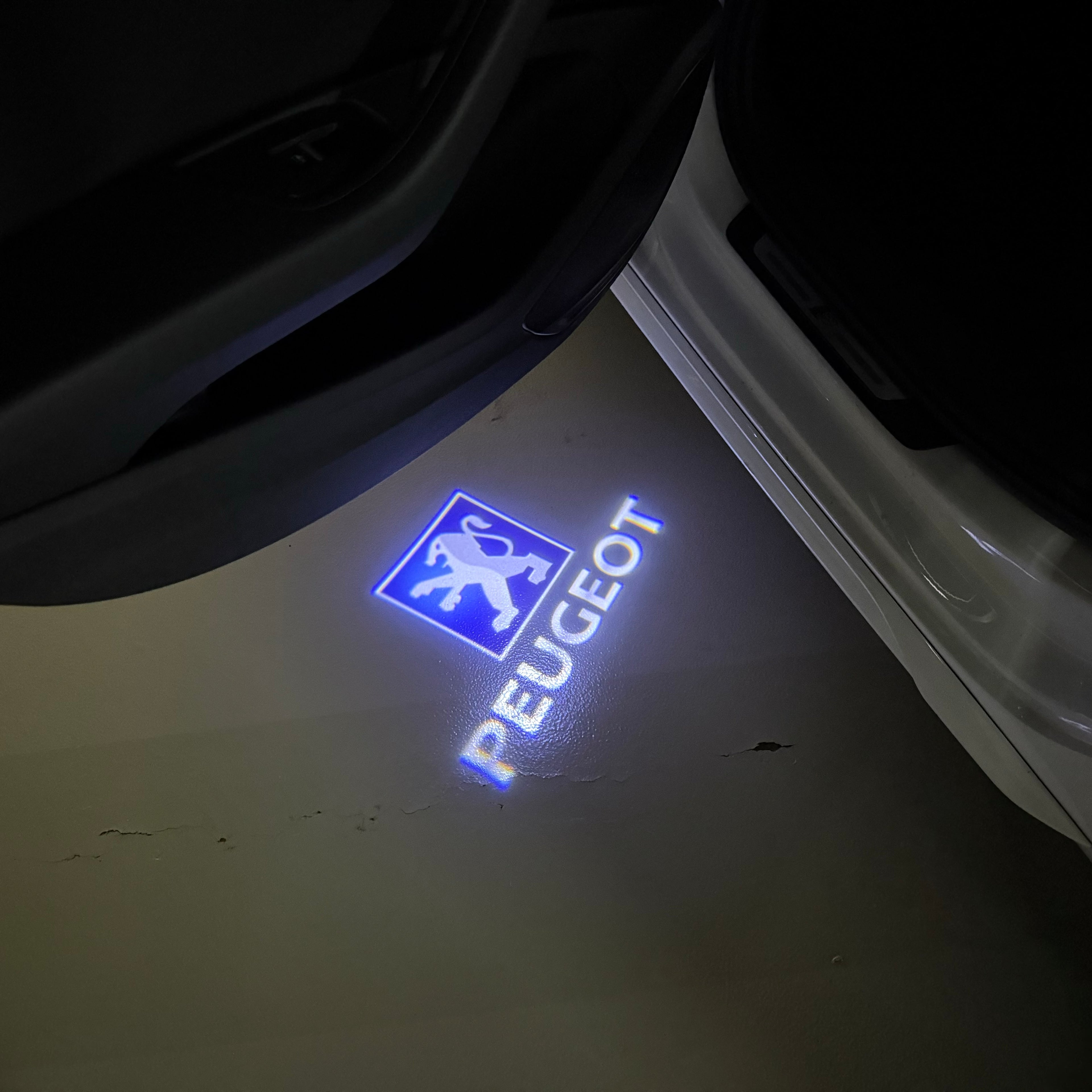 PEUGEOT ORIGINAL  LOGO PROJECTOT LIGHTS (quantity 1 = 1 sets/2 door lights) Nr.6024q68