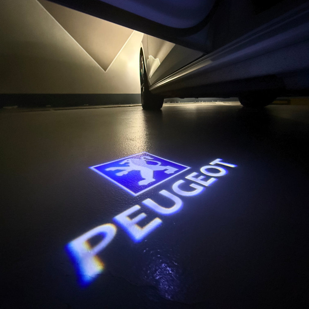 PEUGEOT ORIGINAL  LOGO PROJECTOT LIGHTS (quantity 1 = 1 sets/2 door lights) Nr.6024q68
