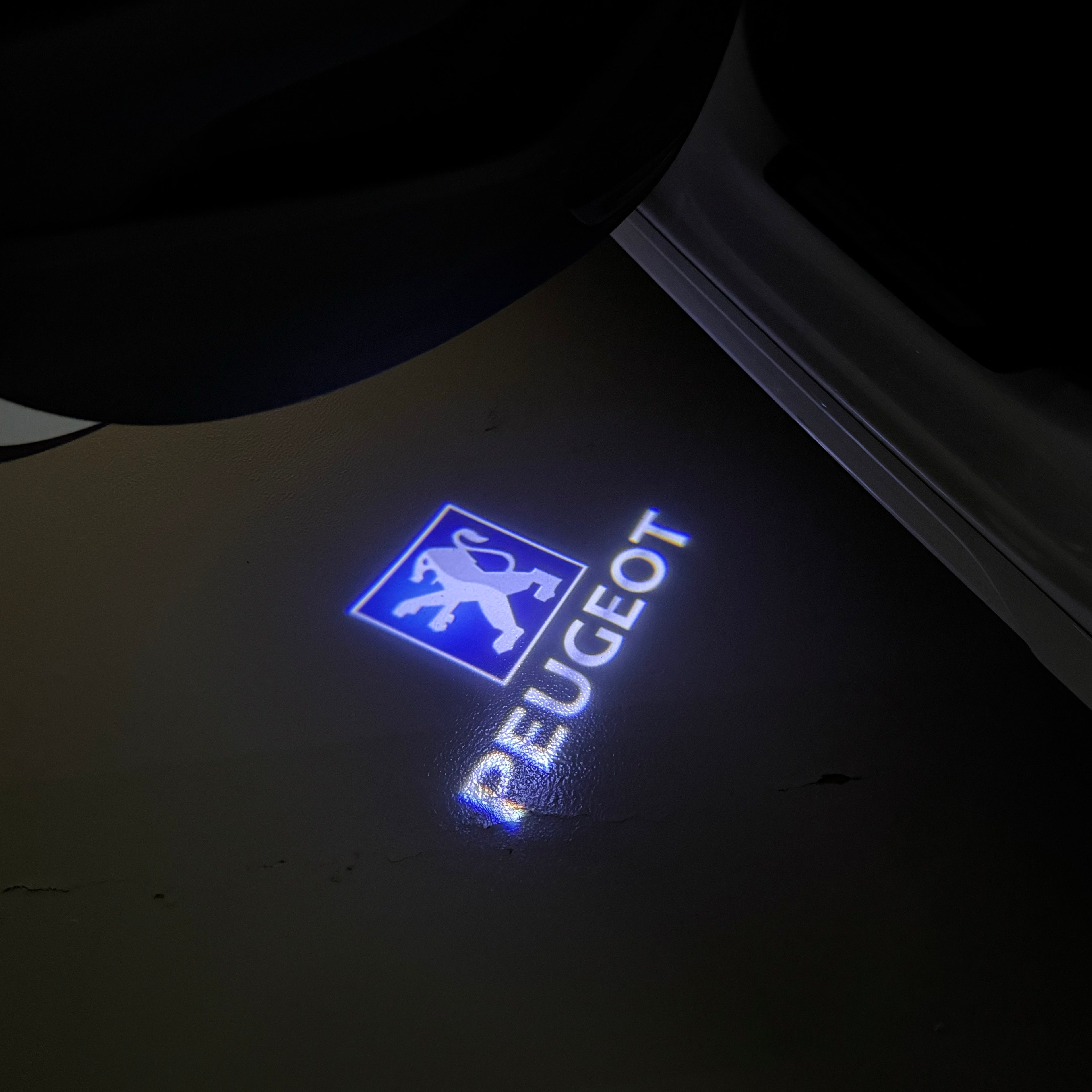 PEUGEOT ORIGINAL  LOGO PROJECTOT LIGHTS (quantity 1 = 1 sets/2 door lights) Nr.6024q68