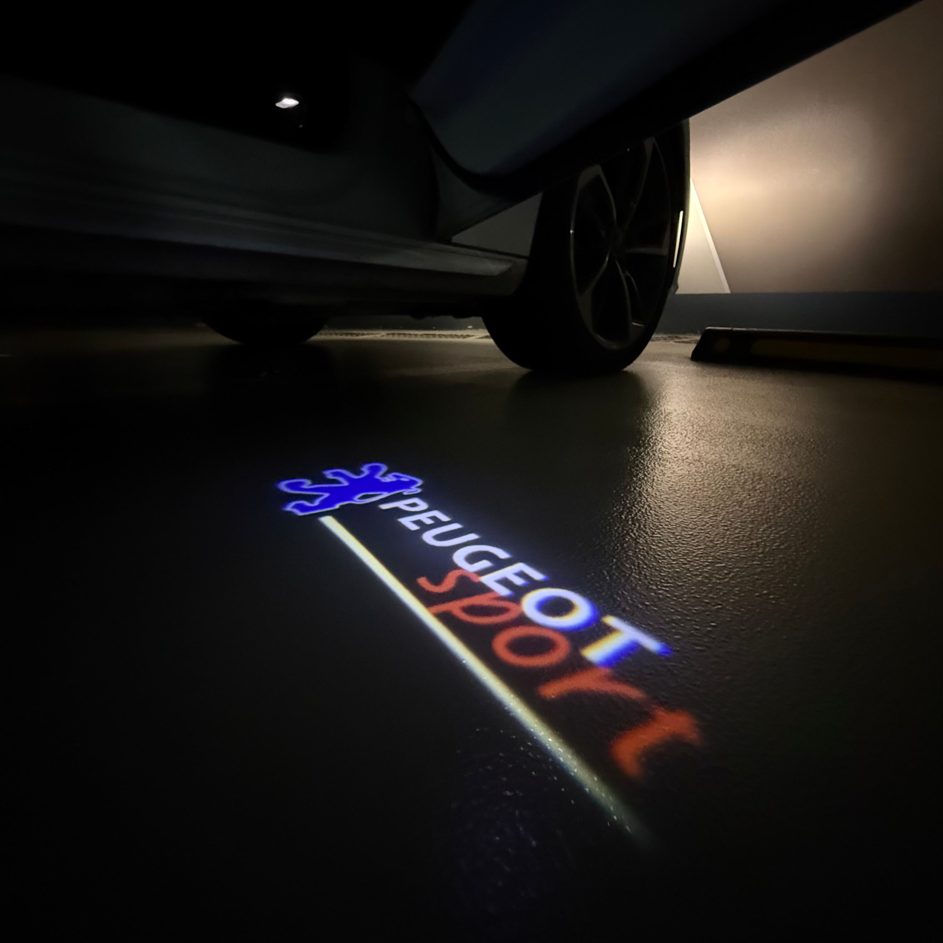 PEUGEOT SPORT  LOGO PROJECTOT LIGHTS (quantity 1 = 1 sets/2 door lights) Nr.6024q77