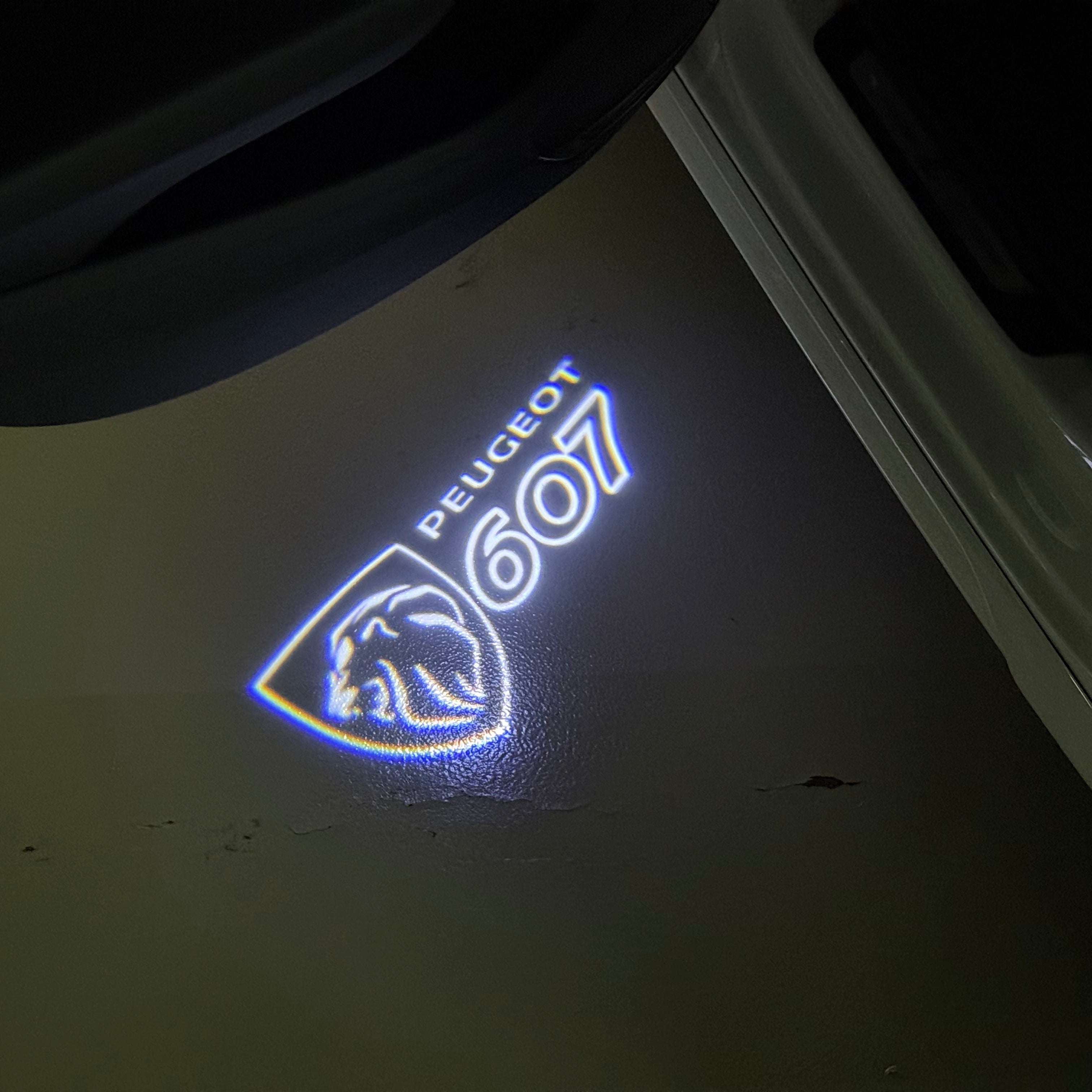 PEUGEOT 607  LOGO PROJECTOT LIGHTS (quantity 1 = 1 sets/2 door lights) Nr.6024q49
