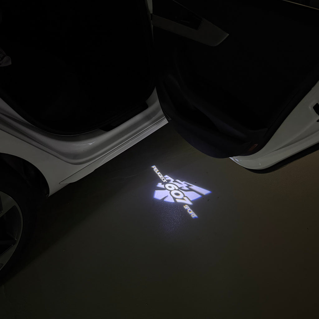 PEUGEOT  607 SPORT  LOGO PROJECTOT LIGHTS (quantity 1 = 1 sets/2 door lights) Nr.6024q53