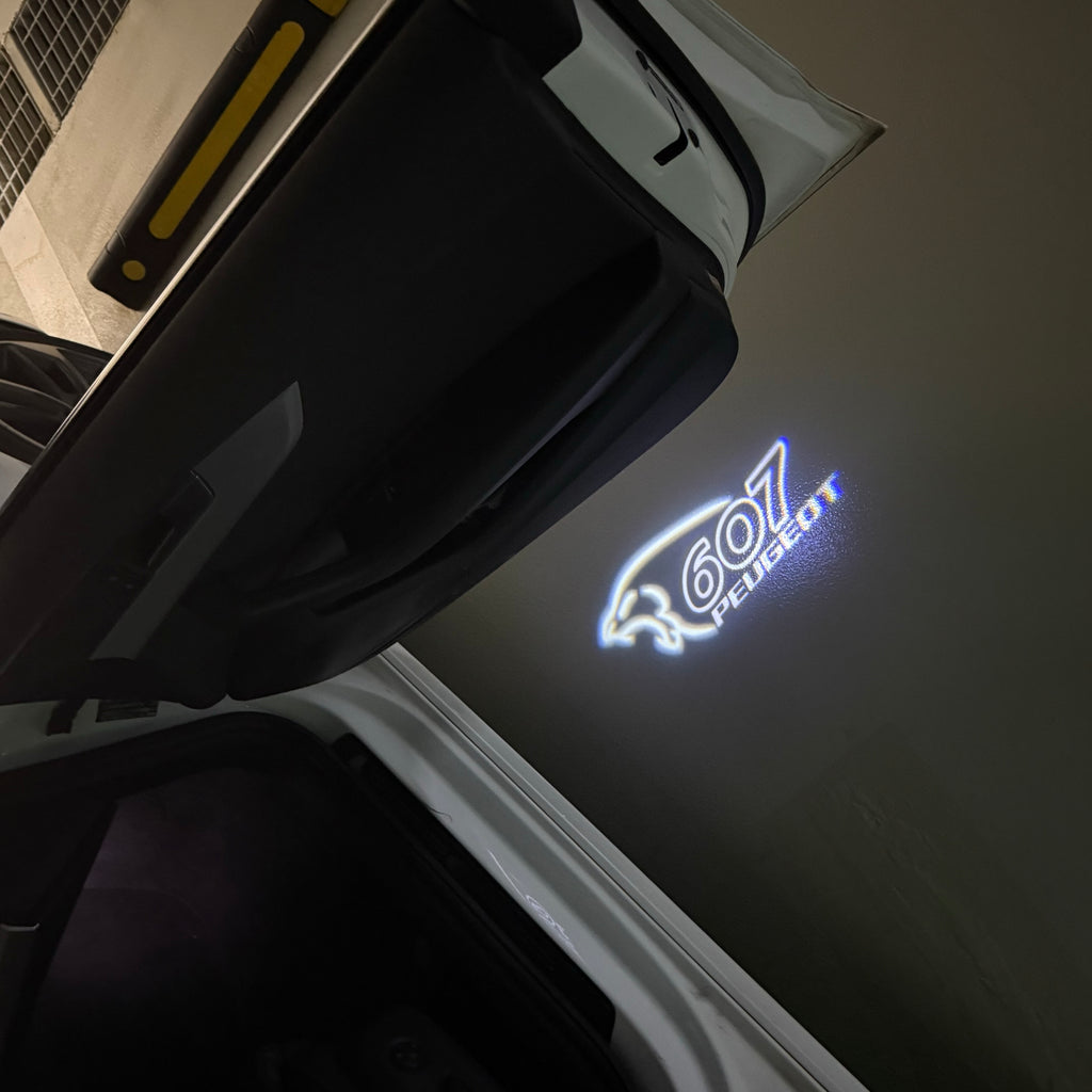 PEUGEOT  607  LOGO PROJECTOT LIGHTS (quantity 1 = 1 sets/2 door lights) Nr.6024q51