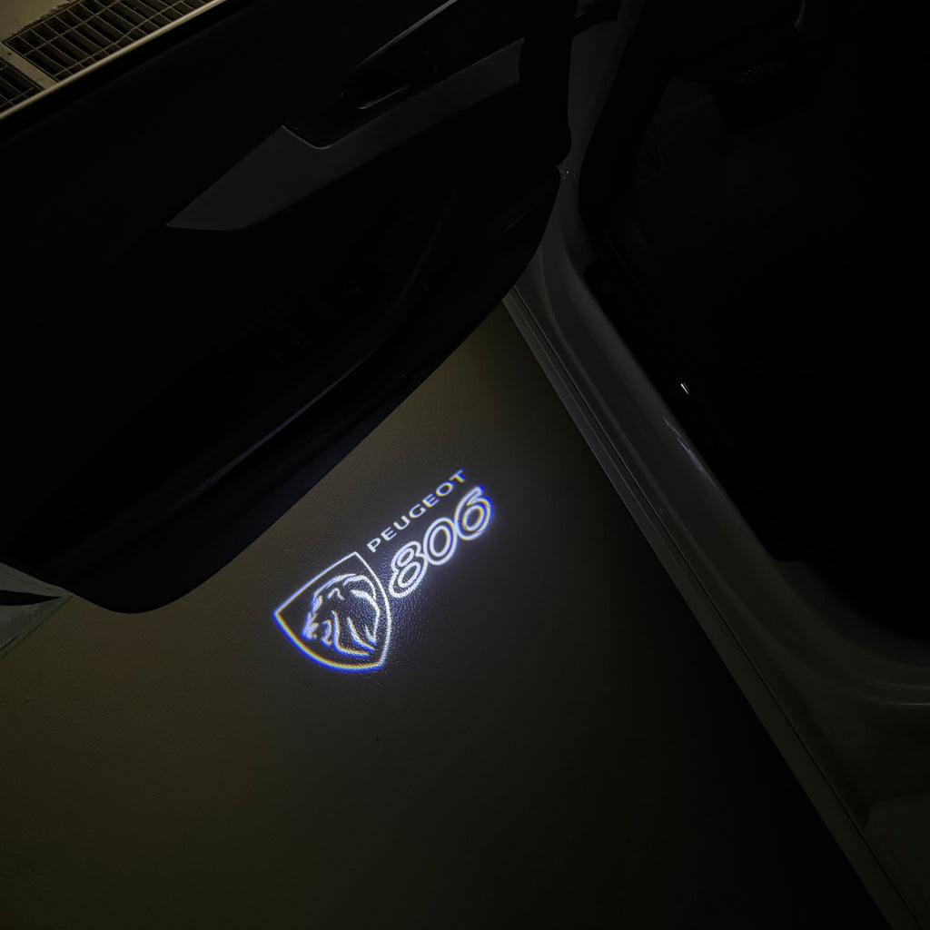 PEUGEOT 806  LOGO PROJECTOT LIGHTS (quantity 1 = 1 sets/2 door lights) Nr.6024q56